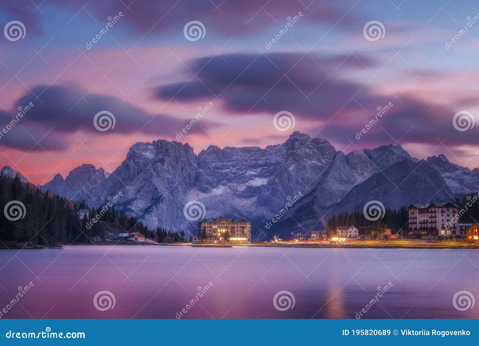 famous tourist place lake lago di misurina on sunset. picture with long e[posure and amazing dramatic sky