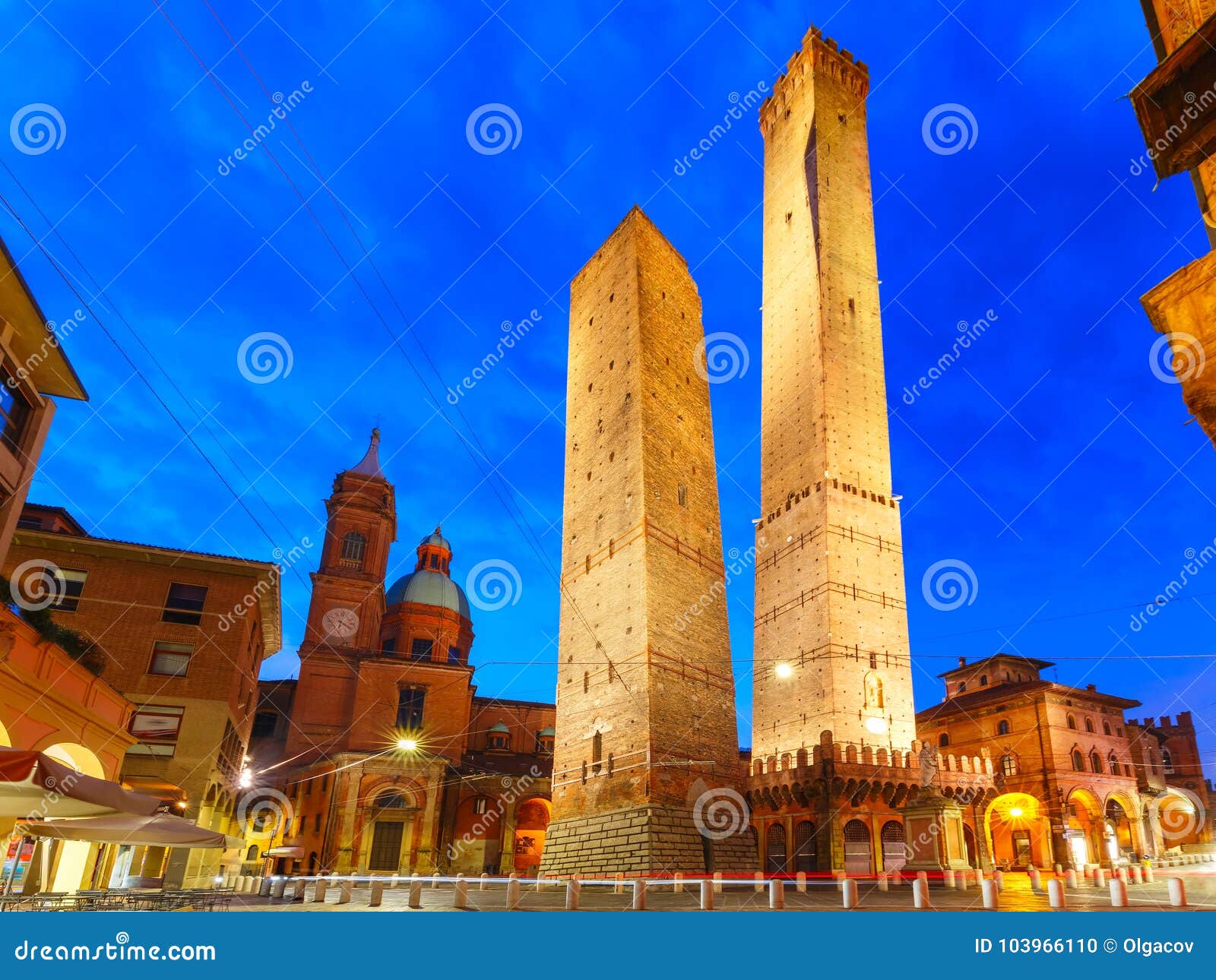 famous two towers of bologna at night, italy