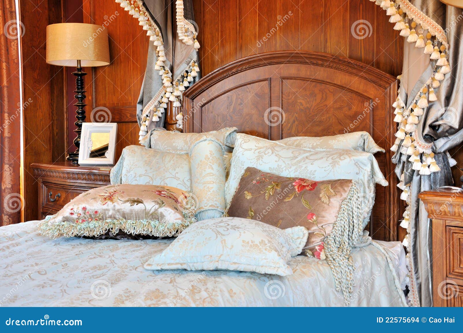 fancy bedroom with flowery curtain