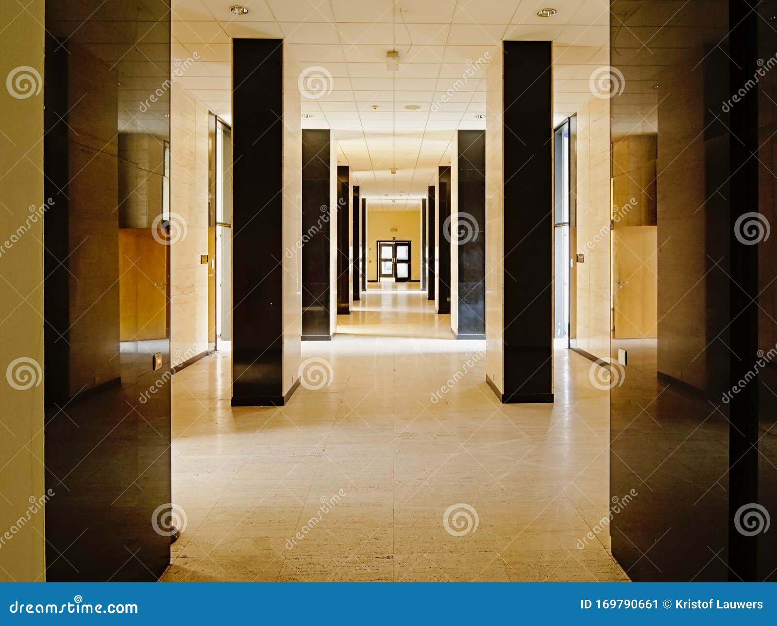 Fancy Hallway of an Office Building, with Pwalls in Marble and Pilars in  Shine Black Granite Editorial Photo - Image of detail, interior: 169790661