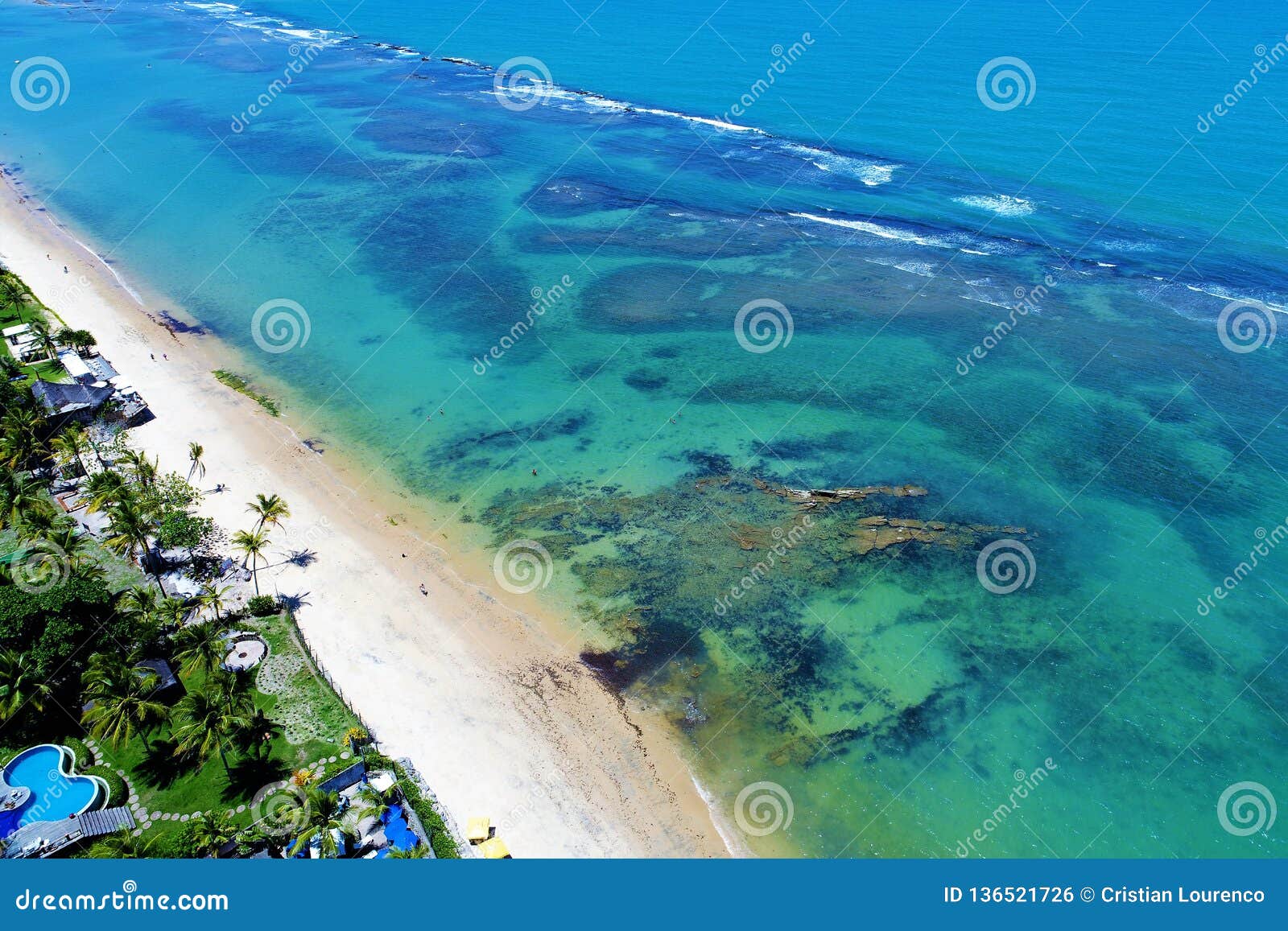 arraial d`ajuda, bahia, brazil: aerial view of a beautiful beach with two colors of water.