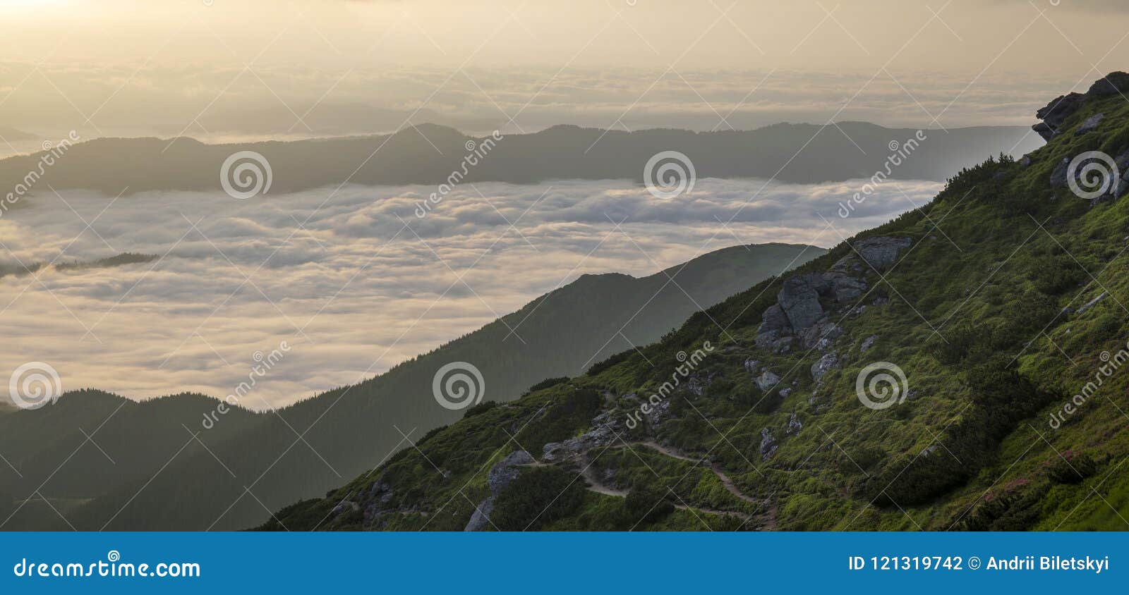 Fantastic View Of Mountain Valley Covered With Low White Puffy L Stock