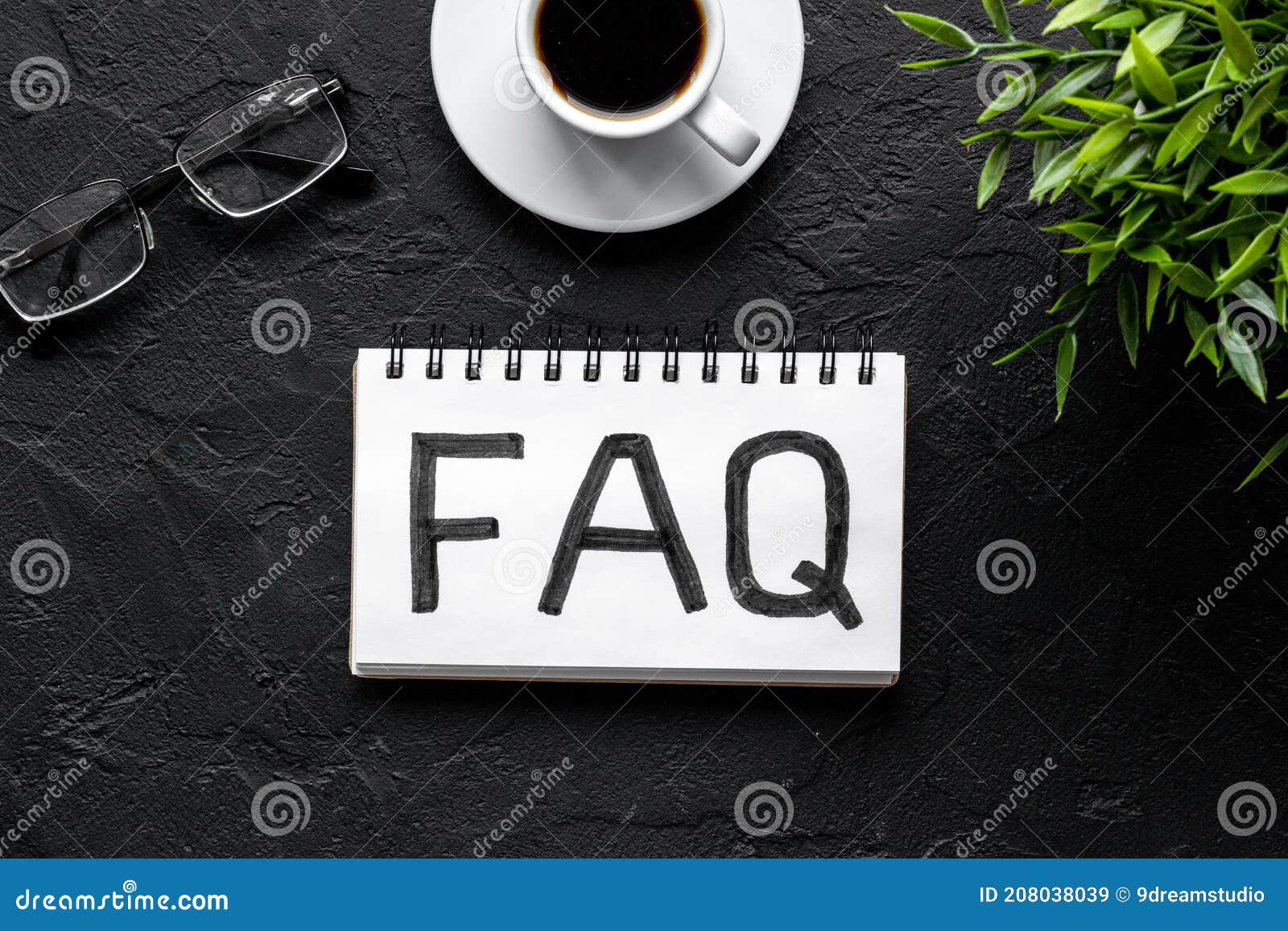 faq - fequently asked question - on table ofiice table. top view