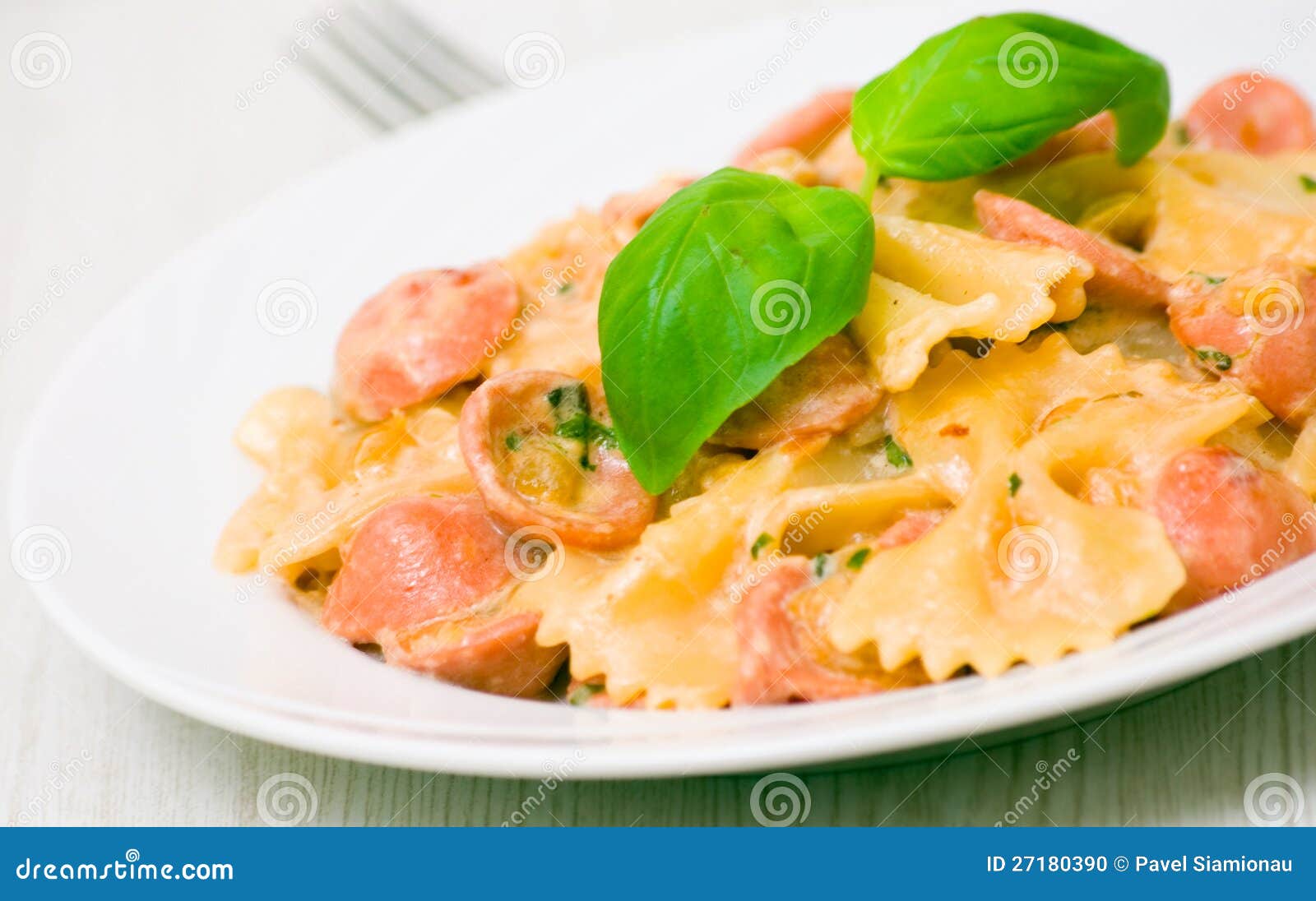 Farfalle Pasta with Sausage and Cream Sauce Stock Photo - Image of leaf