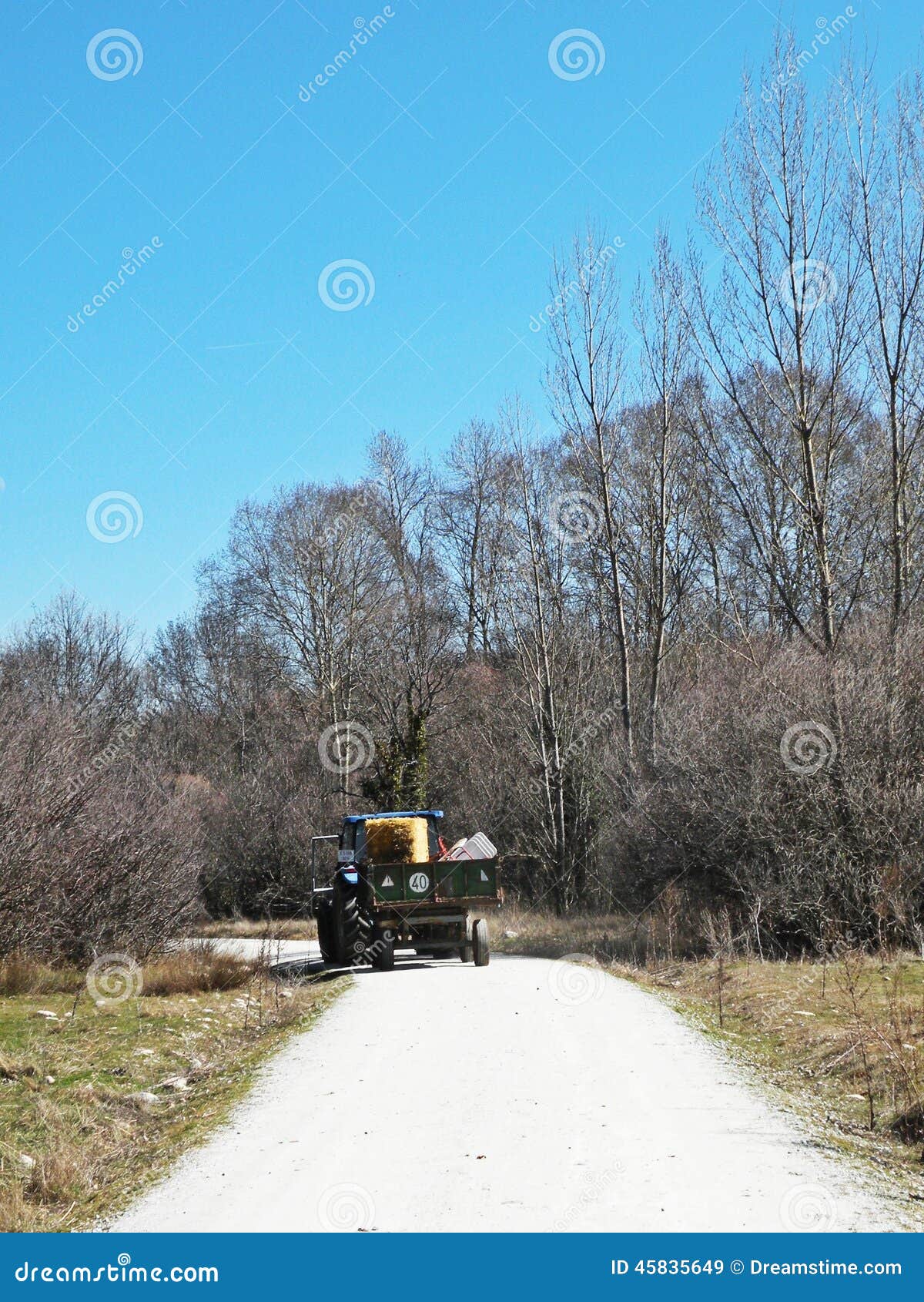 Farm tractor on the road stock image. Image of work, countryside 45835649