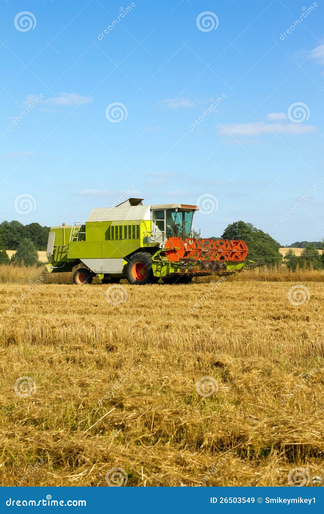 Farm Vehicle Cutting the Crops in Summer Stock Image Image of farming