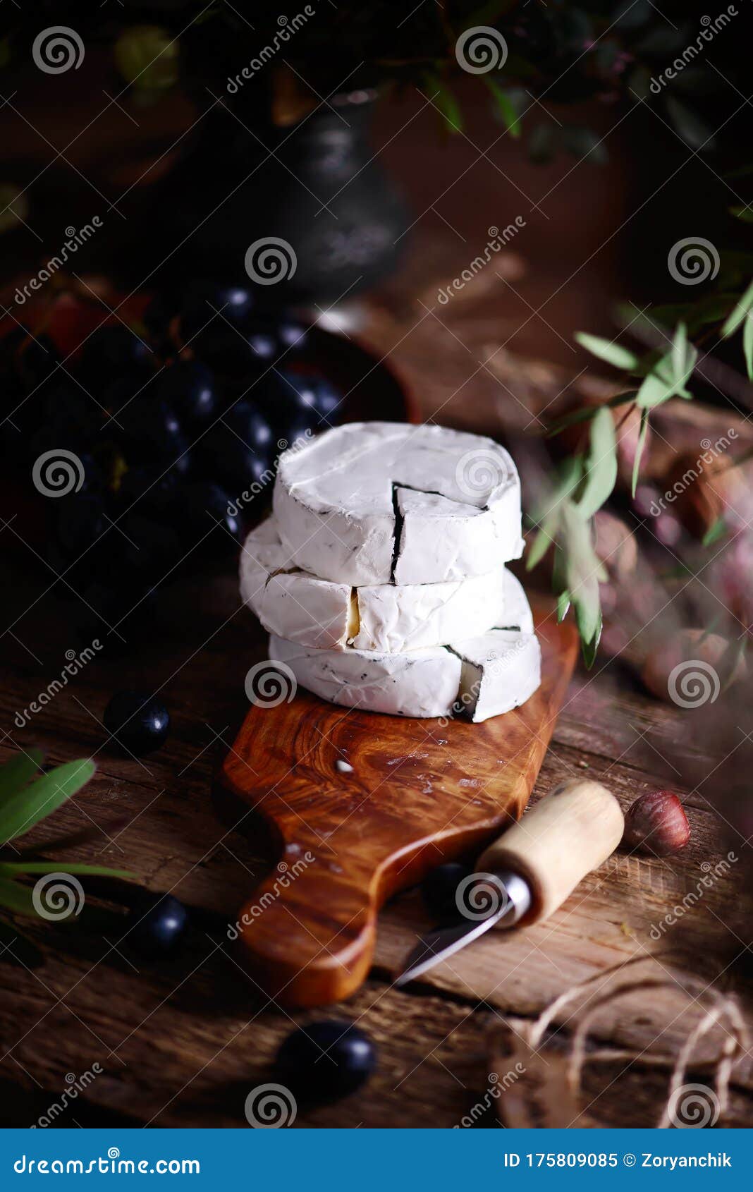 Farmer Camembert Cheese on the Cutting Board. Selective Focus Stock