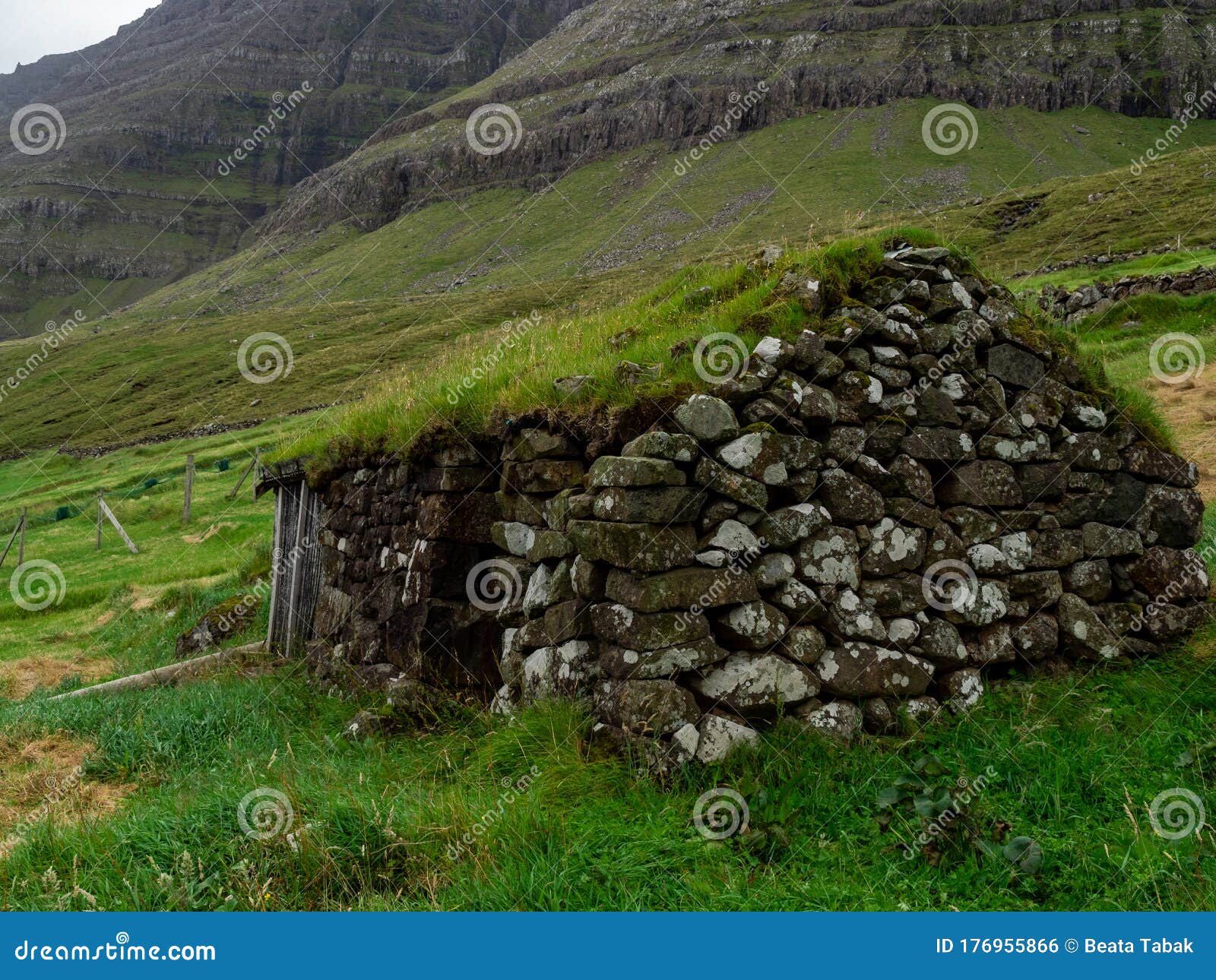 mÃÂºli village. old stone house with grass roof