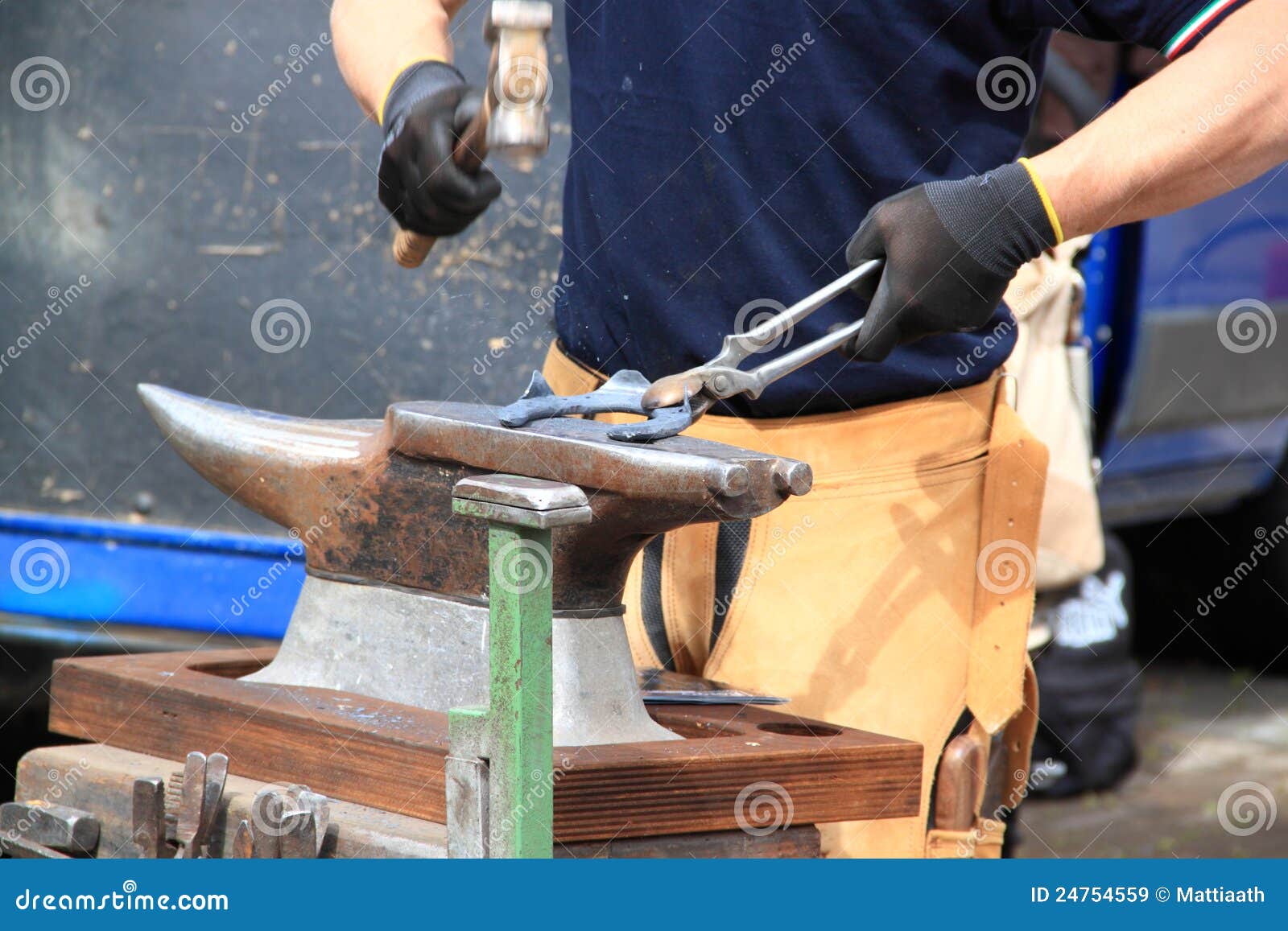 Farrier making a horseshoe stock image. Image of equipment 24754559