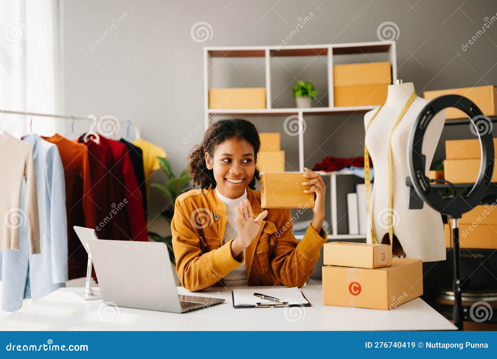Fashion Blogger Concept, Young African Women Selling Clothes on Video  Streaming.Startup Small Business SME, Using Smartphone or Stock Image -  Image of lamp, checking: 276740419
