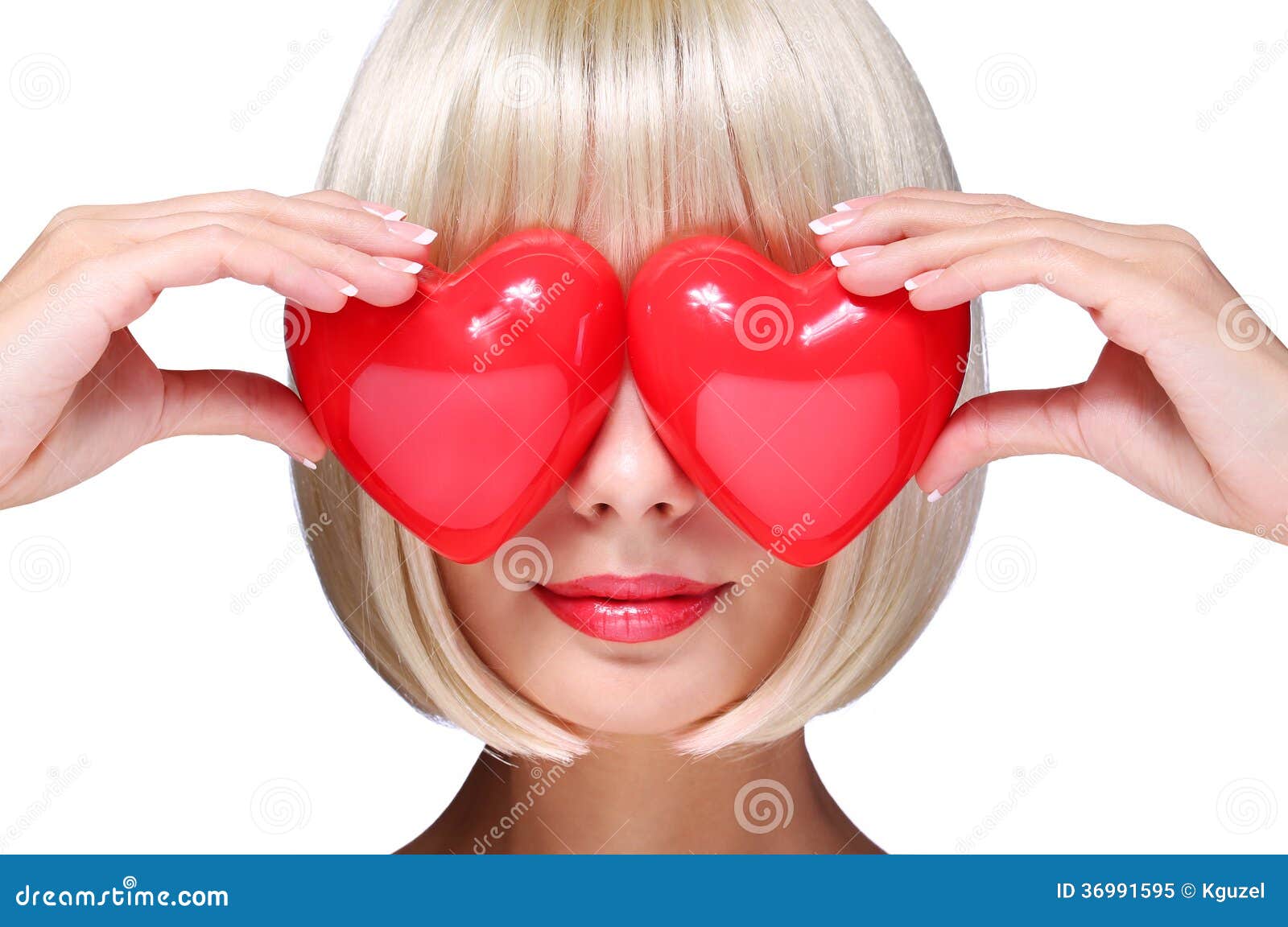 fashion blonde girl with red hearts in valentines day. glamorous