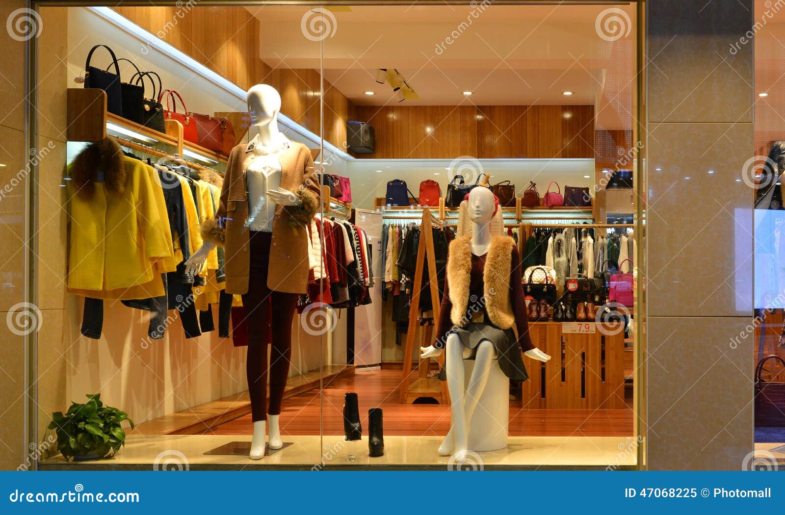 fashion boutique display window with mannequins, go shopping, dress shop window