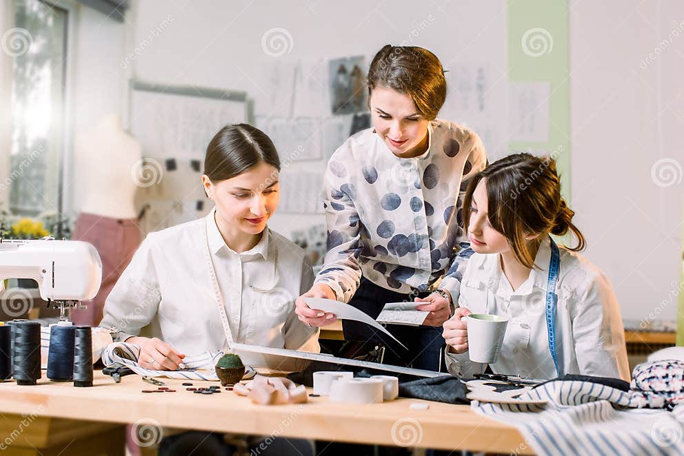 Fashion Design, Dressmaker, Tailor Concept. Three Young Caucasian Women ...