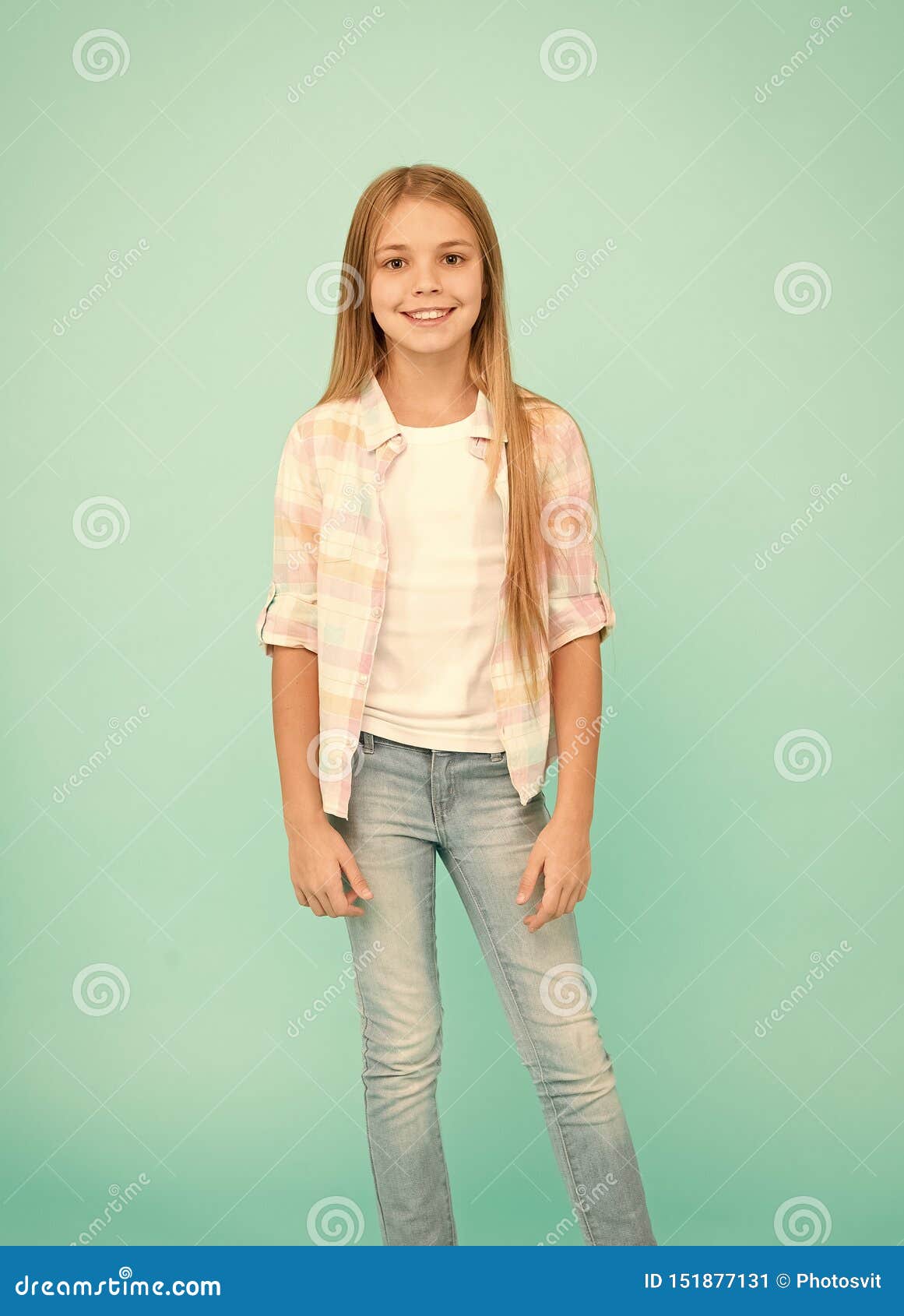 Fashion Design Makes The Baby So Cute. Little Girl With Long Blond Hair