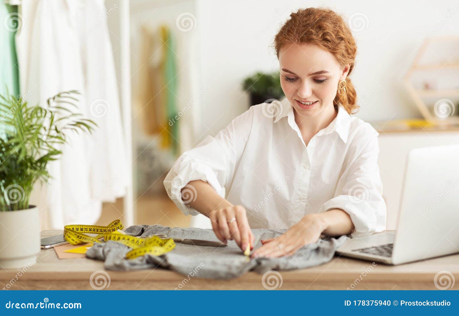 Woman is Drawing Patterns with Soap or Chalk on Cloth Stock Photo ...