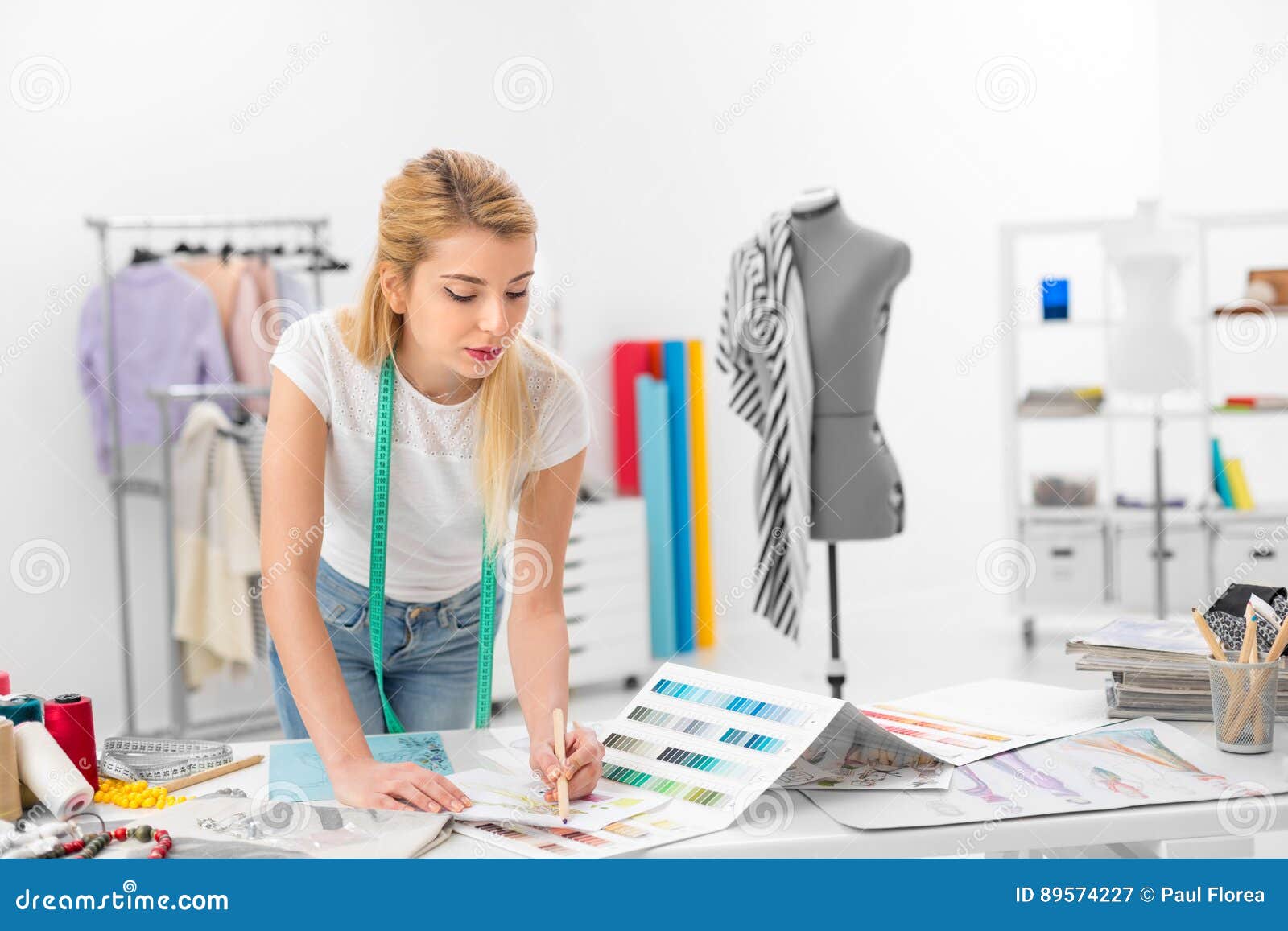 Fashion Designer Colouring a Sketch Stock Image - Image of hair ...