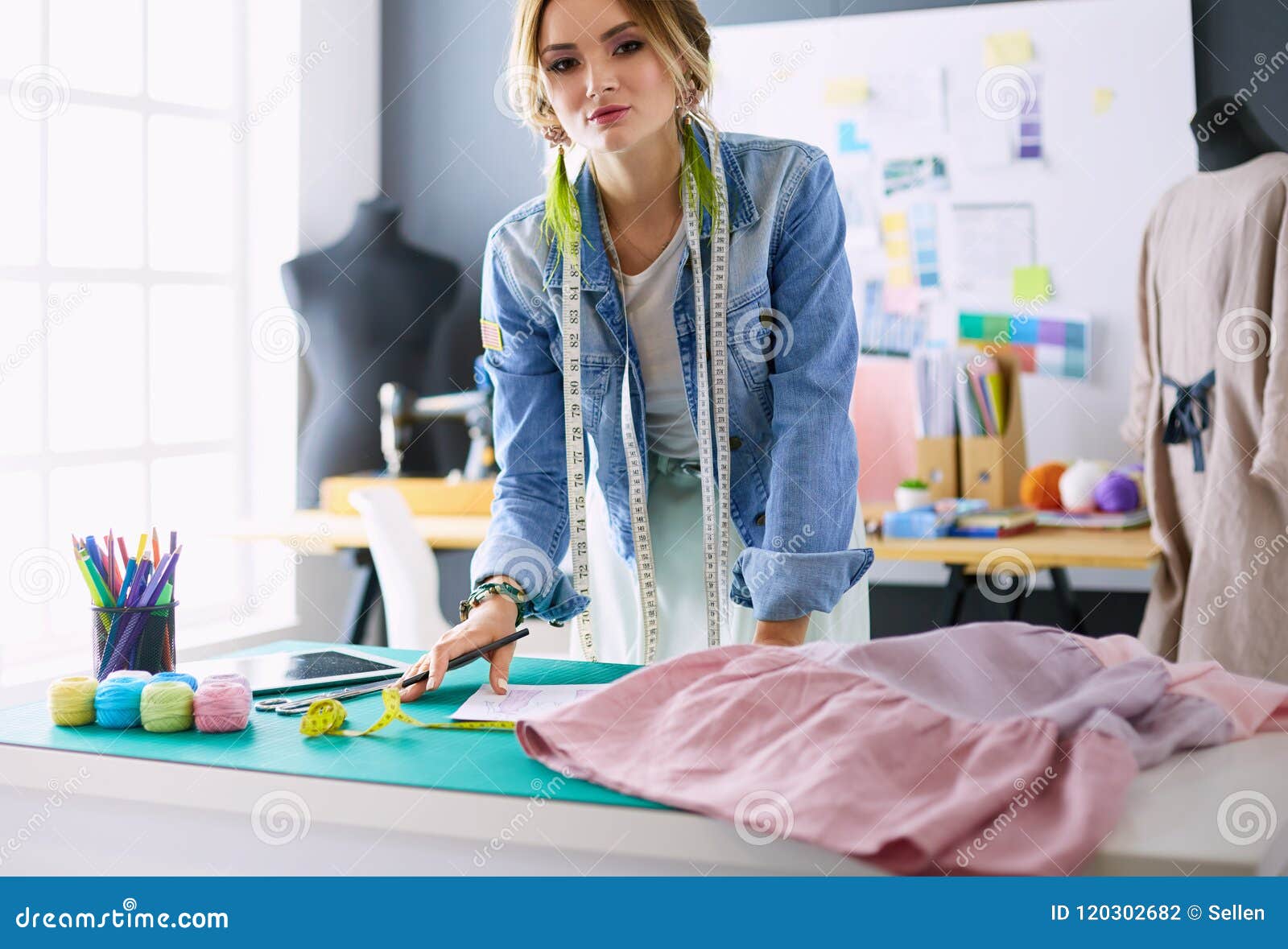 Fashion Designer Woman Working on Her Designs in the Studio Stock Photo ...