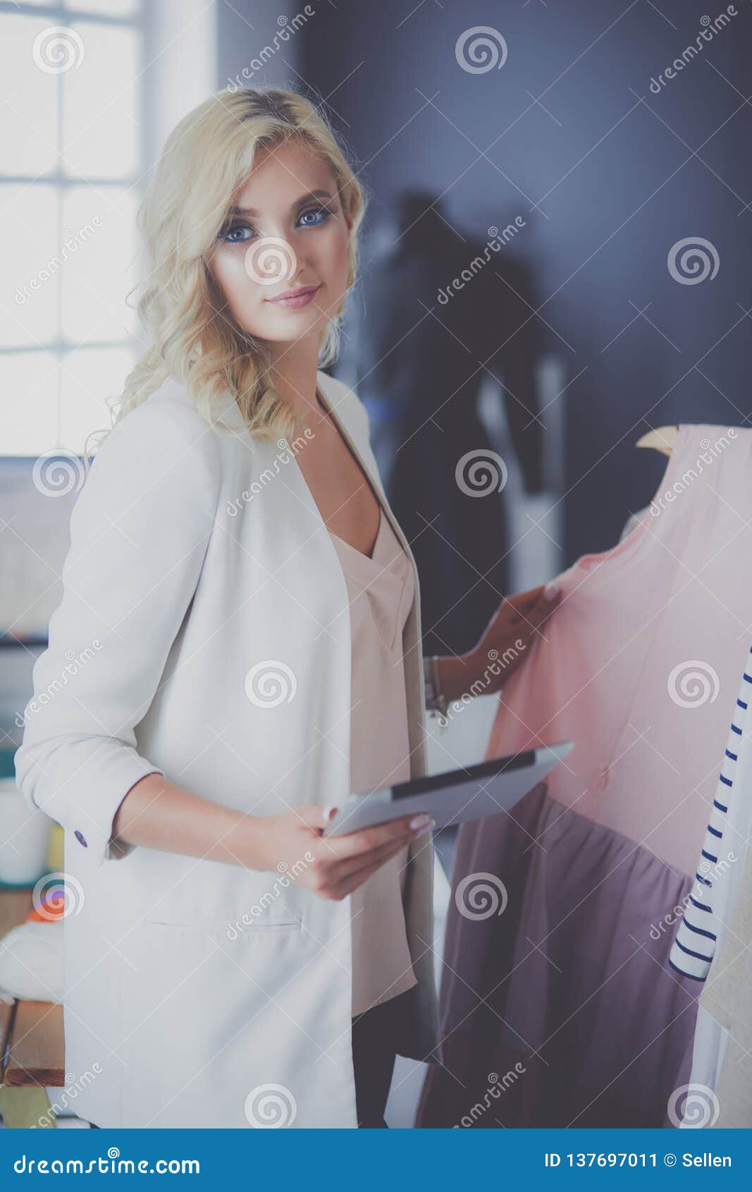 Fashion Designer Woman Working on Her Designs in the Studio. Stock ...