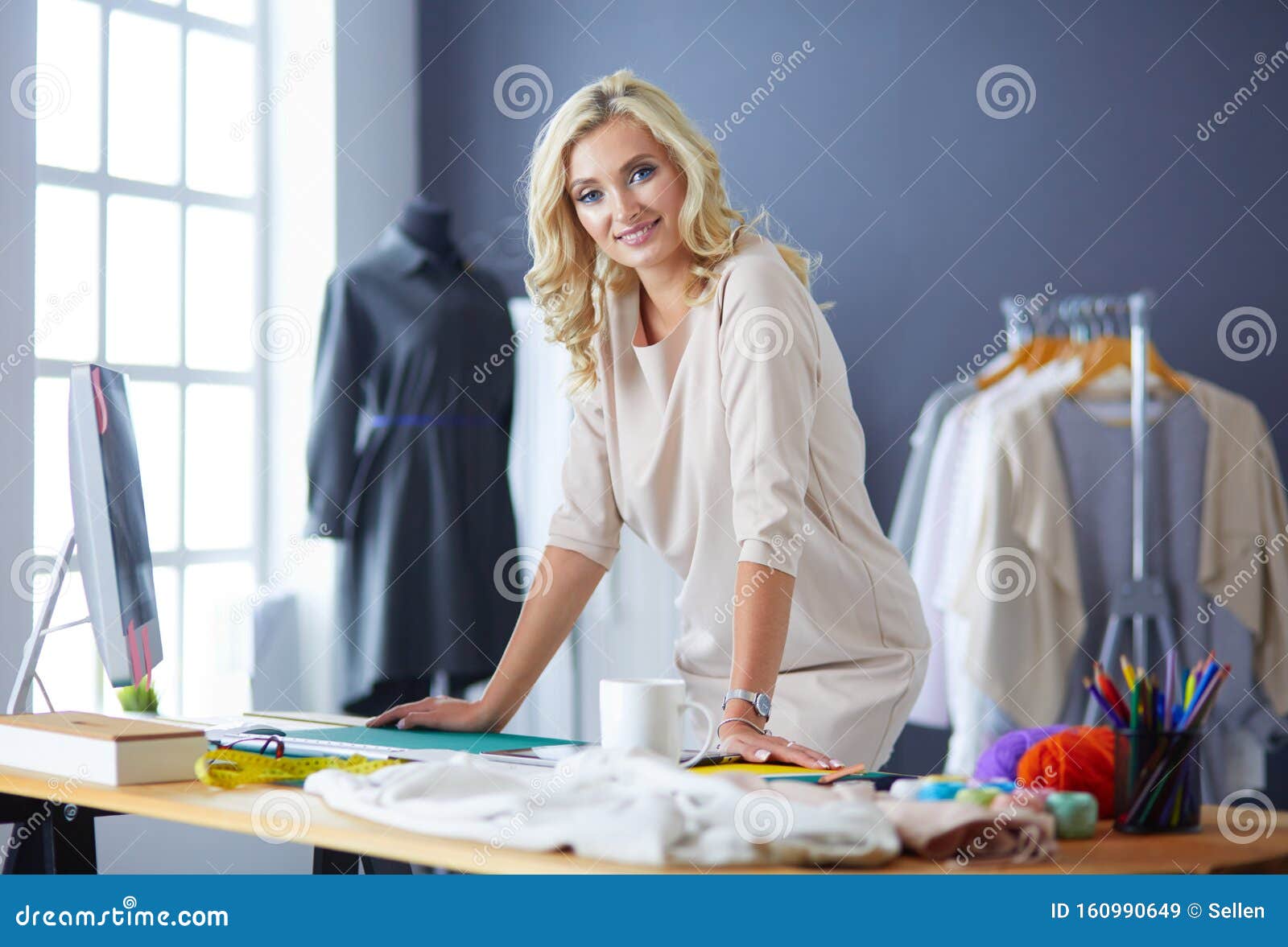 Fashion Designer Woman Working on Her Designs in the Studio. Stock ...