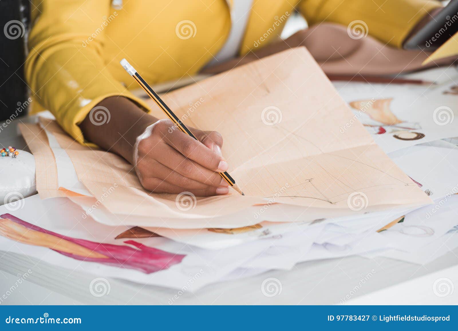 Fashion Designer Working at Table in Clothing Design Studio Stock Image ...