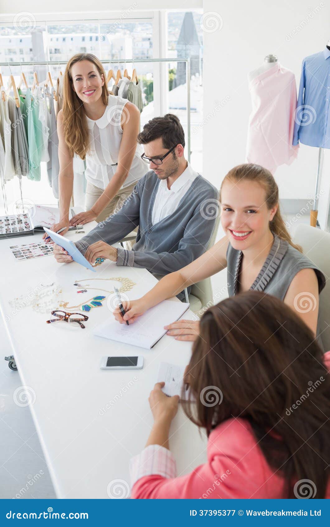 Fashion Designers Discussing Designs Stock Image Image of front