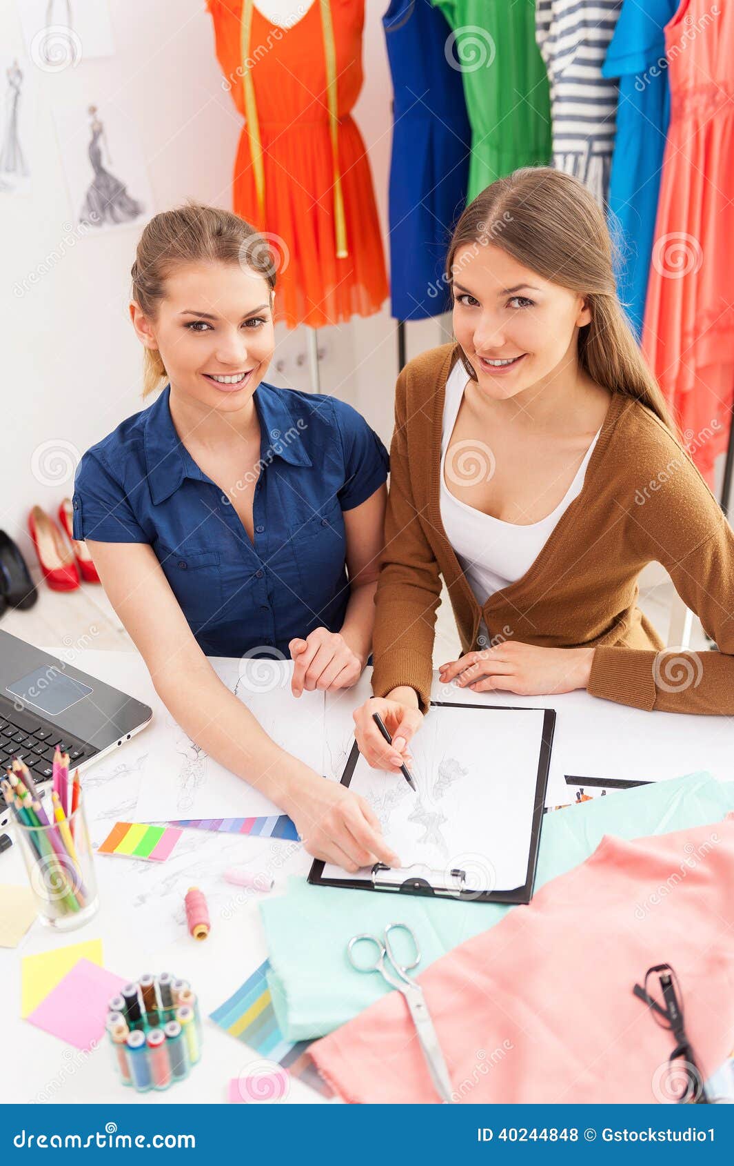 Fashion designers at work. stock photo. Image of assistance - 40244848