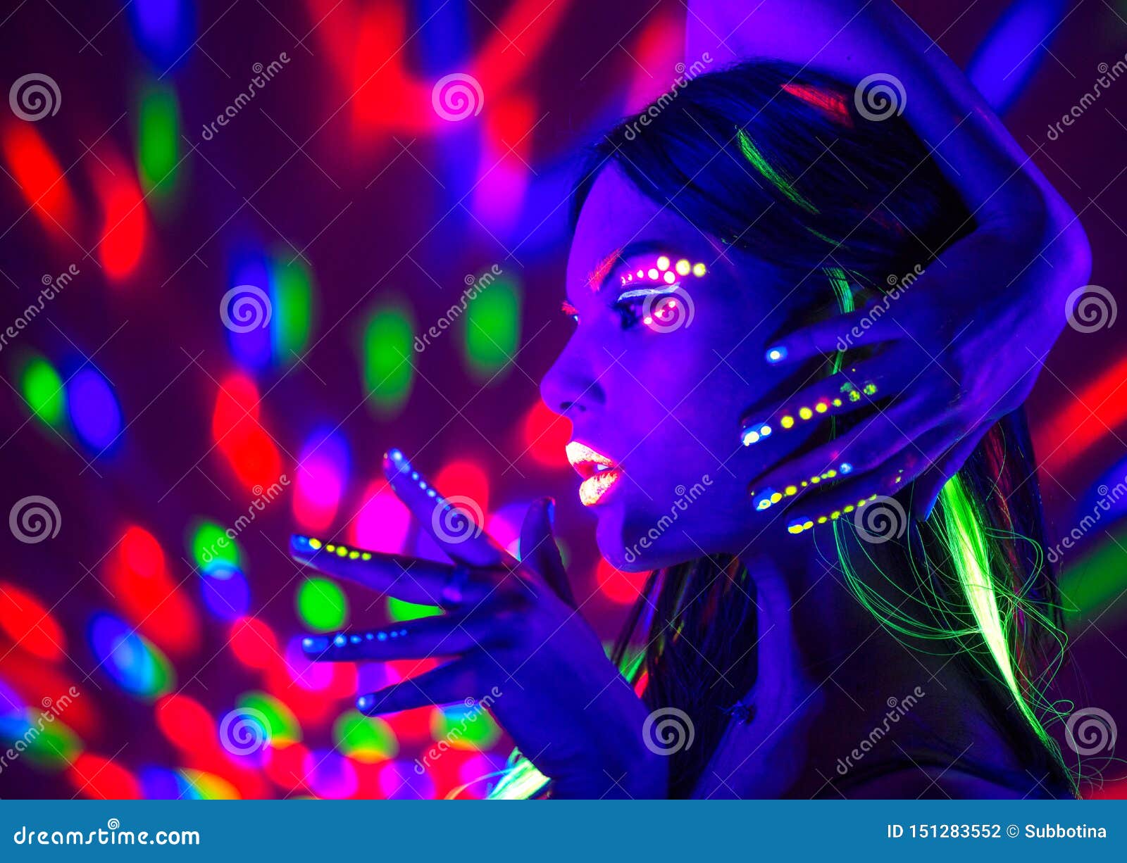fashion disco woman. dancing model in neon light, portrait of beauty girl with fluorescent makeup