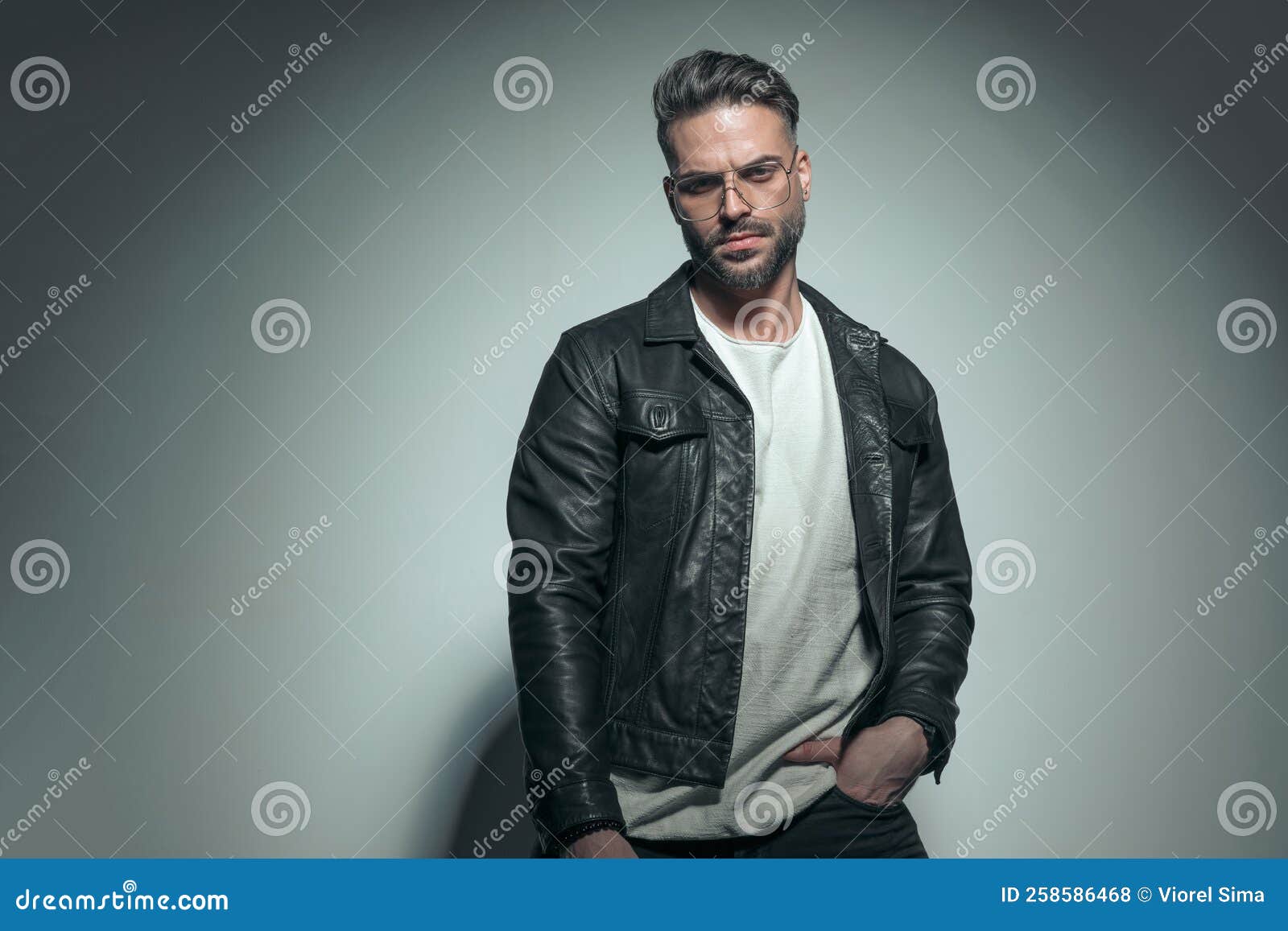 Fashion Guy Posing with Attiude, Putting a Hand in Pocket Stock Photo ...