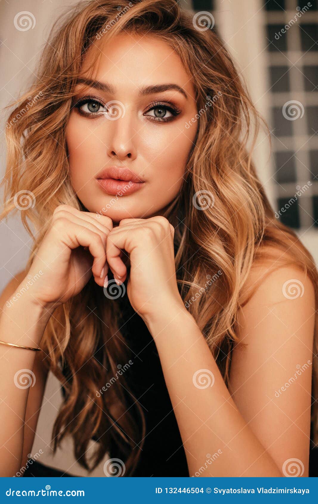 https://thumbs.dreamstime.com/z/fashion-interior-photo-beautiful-woman-blond-curly-hair-elegant-dress-jewelry-accessories-jewe-132446504.jpg