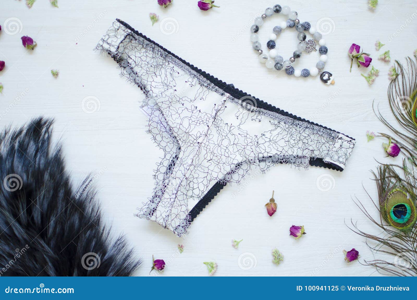 Sexy White Lace Bra And Panties On Pink Background. Stylish