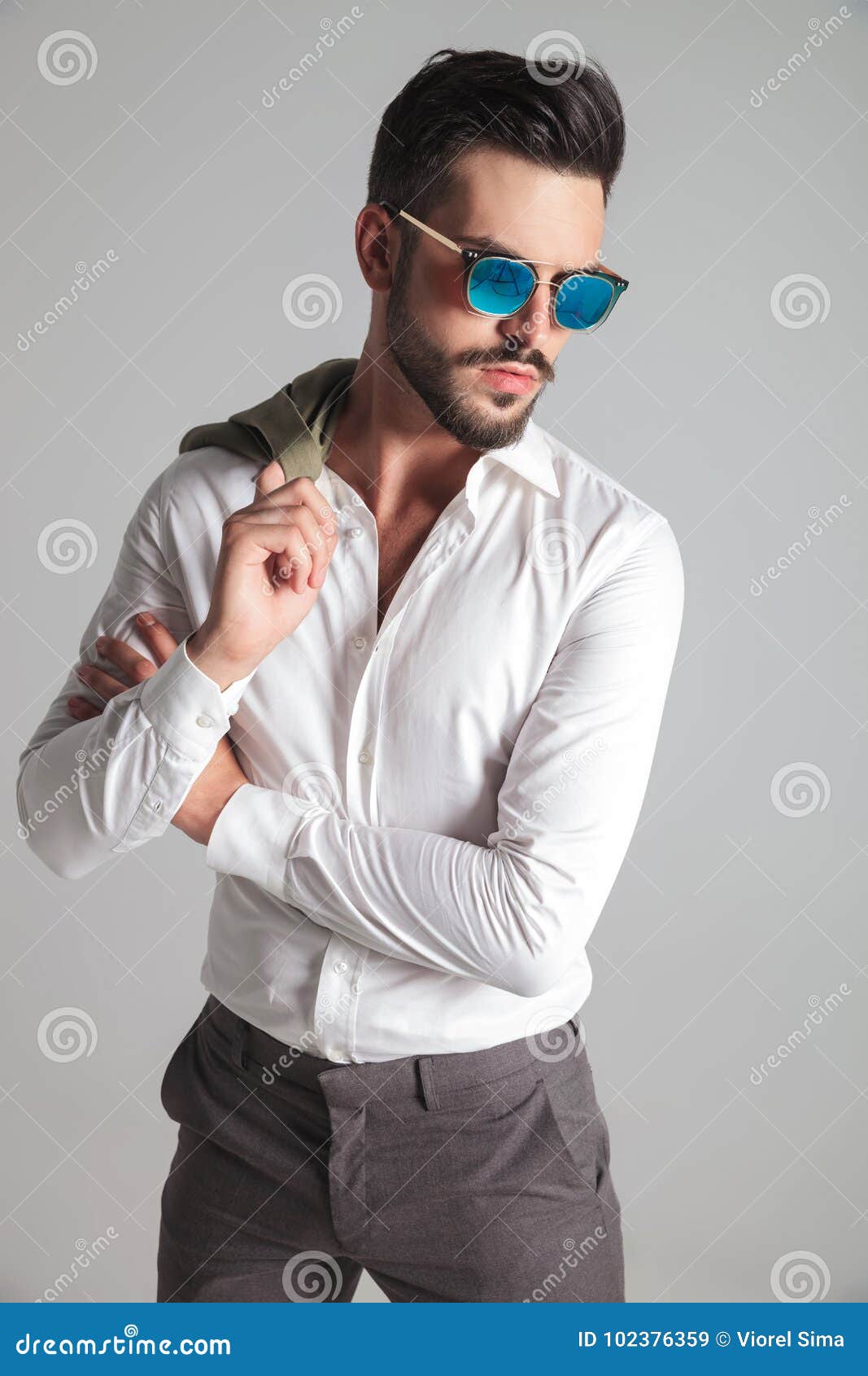 Fashion Man with Coat on Shoulder Holding His Elbow Stock Image - Image ...