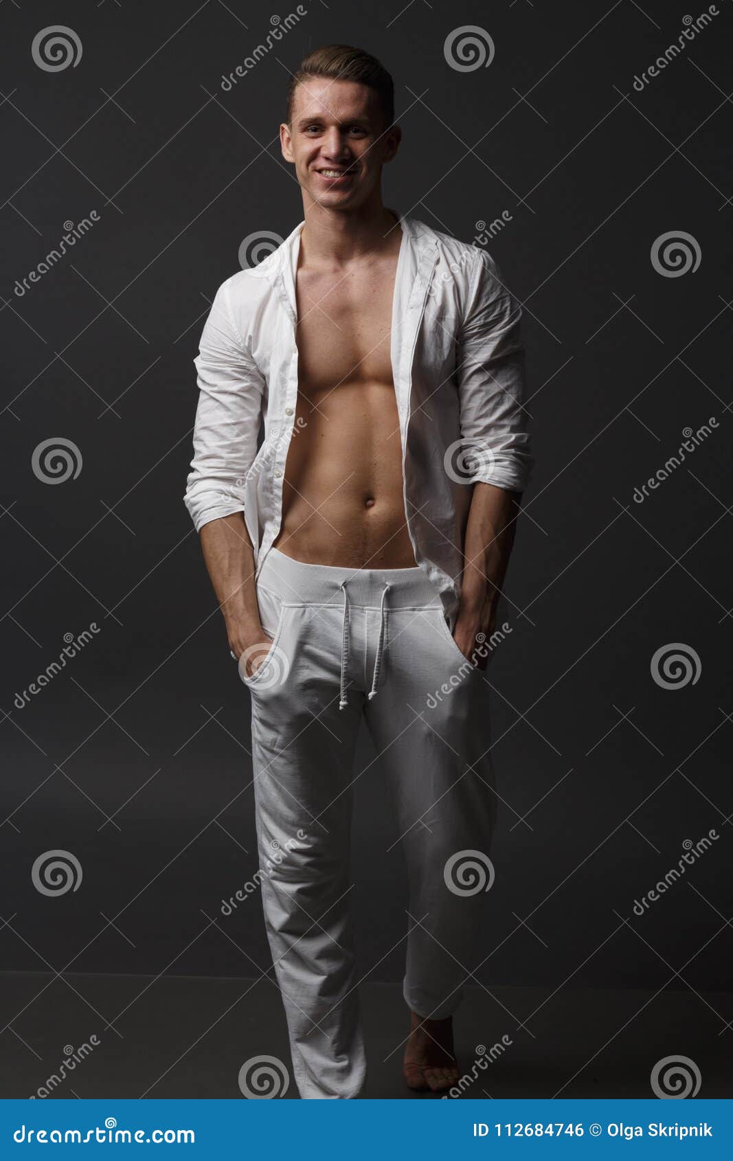 Picture Of A Creamy Silk Blouse, A Creamy Oversized Blazer, White Cropped Pants, Nude Heels For A Casual Feel