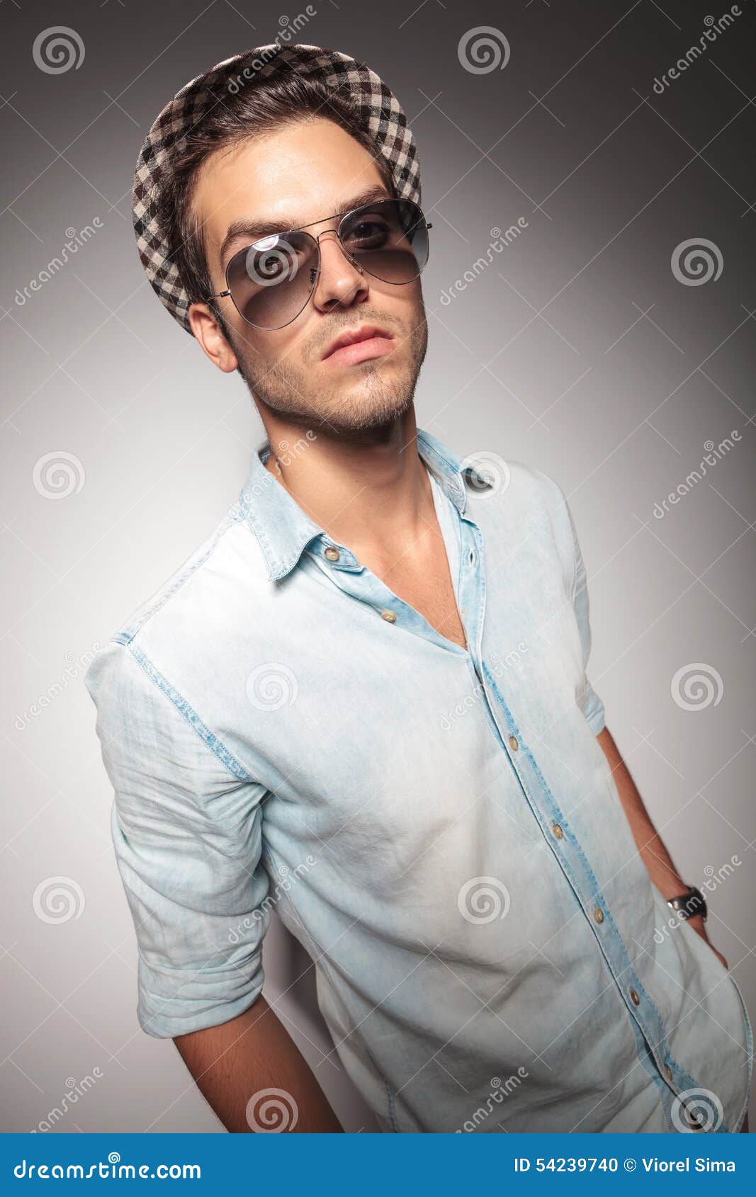 Fashion Man Posing on Grey Studio Background. Stock Photo - Image of ...