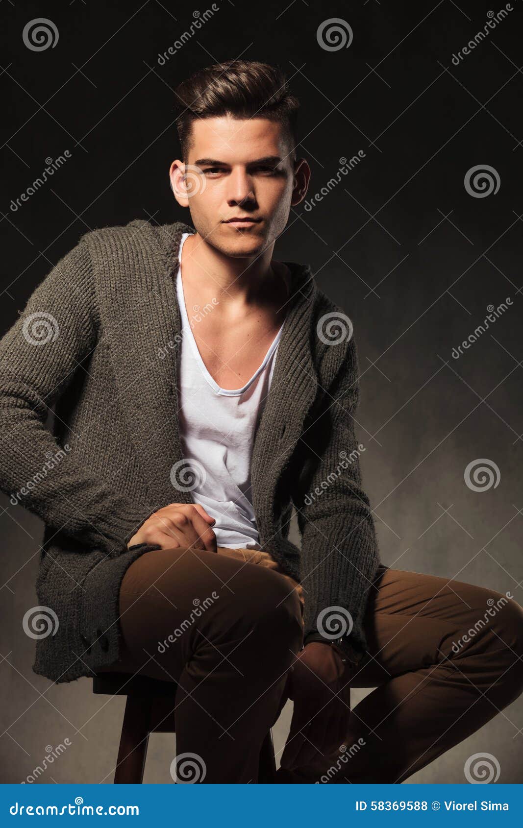 Fashion Man Wearing a White Shirt and a Grey Sweater Stock Photo ...