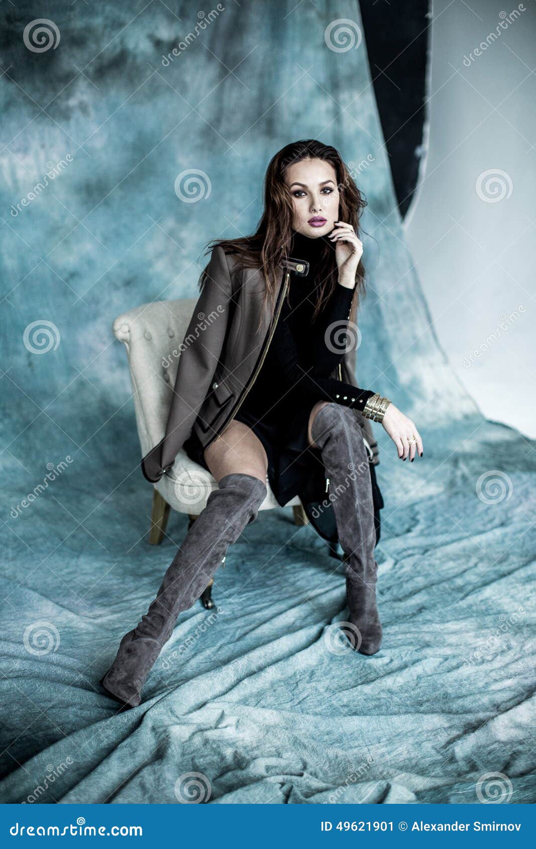 Fashion Military Style. Model in Jacket, Skirt and Boots Posing Stock ...
