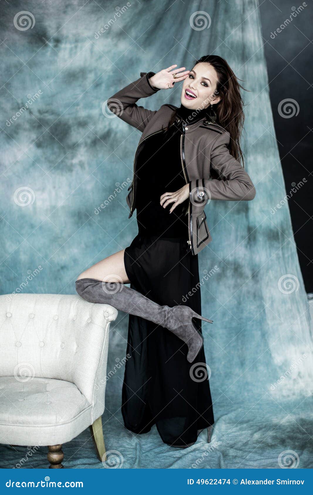 Fashion Military Style. Model in Jacket, Skirt and Boots Posing Stock ...