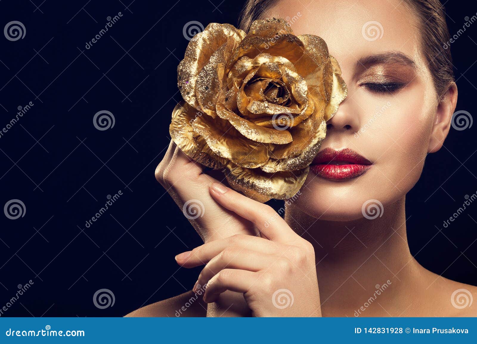 fashion model beauty portrait with gold rose flower, golden woman luxury makeup an rose jewelry