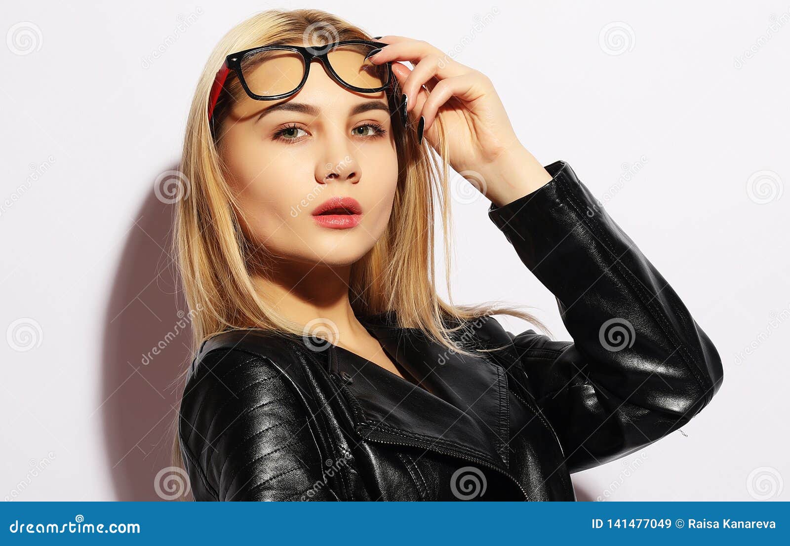 Fashion Model in Black Clothing. Leather Jacket and Pants, Glasses ...
