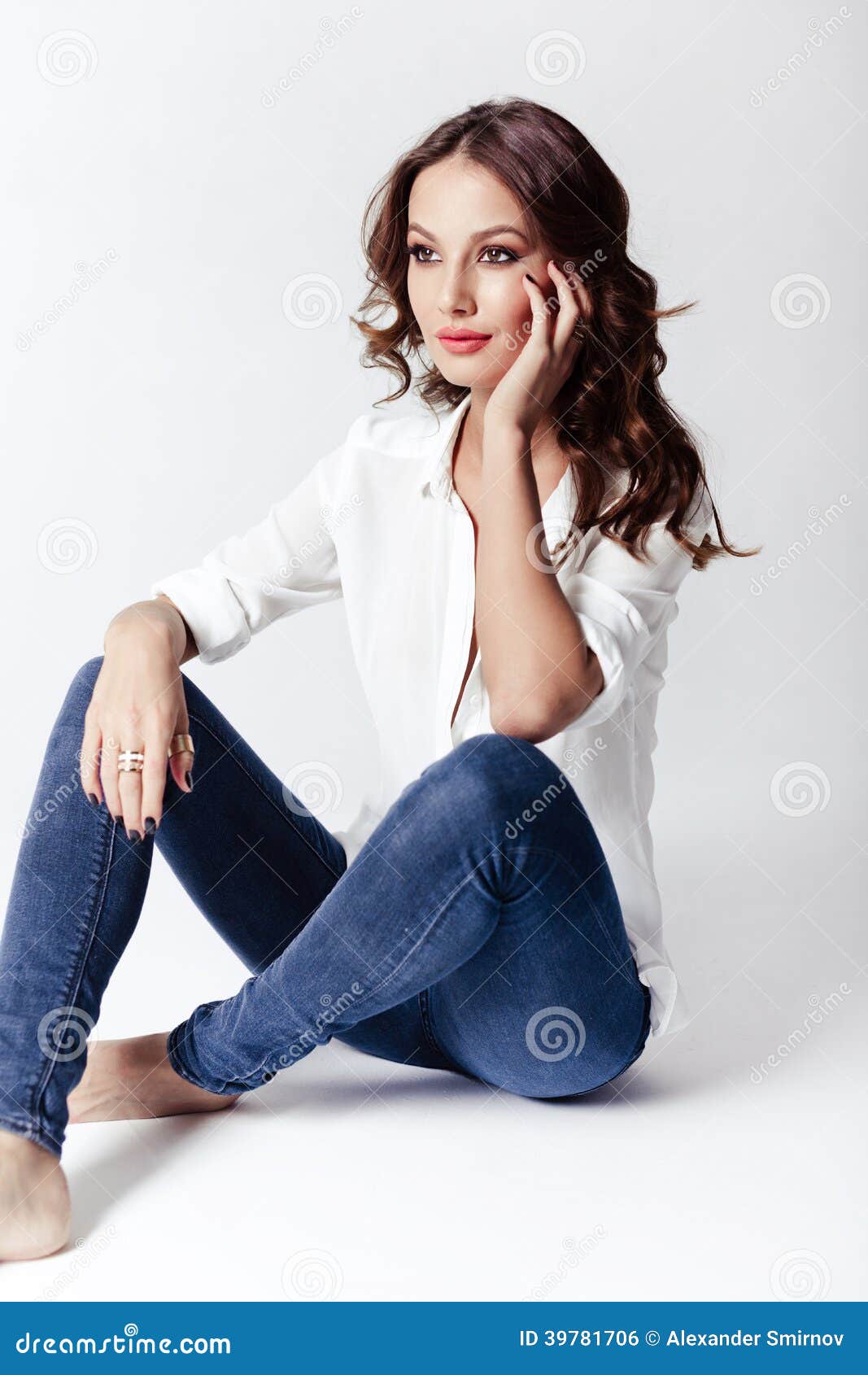 Fashion Model in a Blouse and Jeans Barefoot Stock Photo - Image of ...