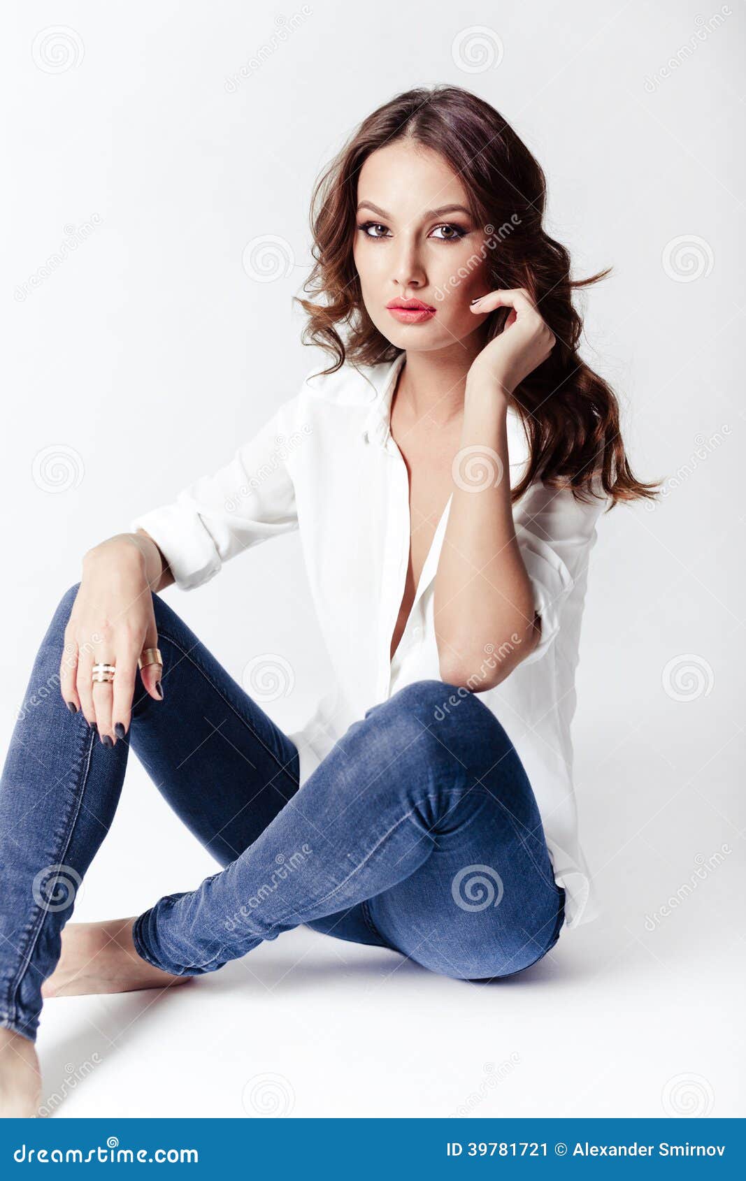 Fashion Model in a Blouse and Jeans Barefoot Stock Image - Image of ...