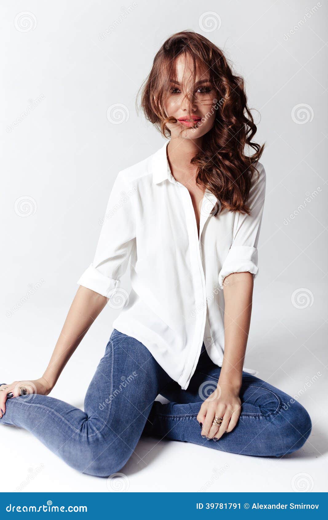 Fashion Model in a Blouse and Jeans Barefoot Stock Image - Image of ...