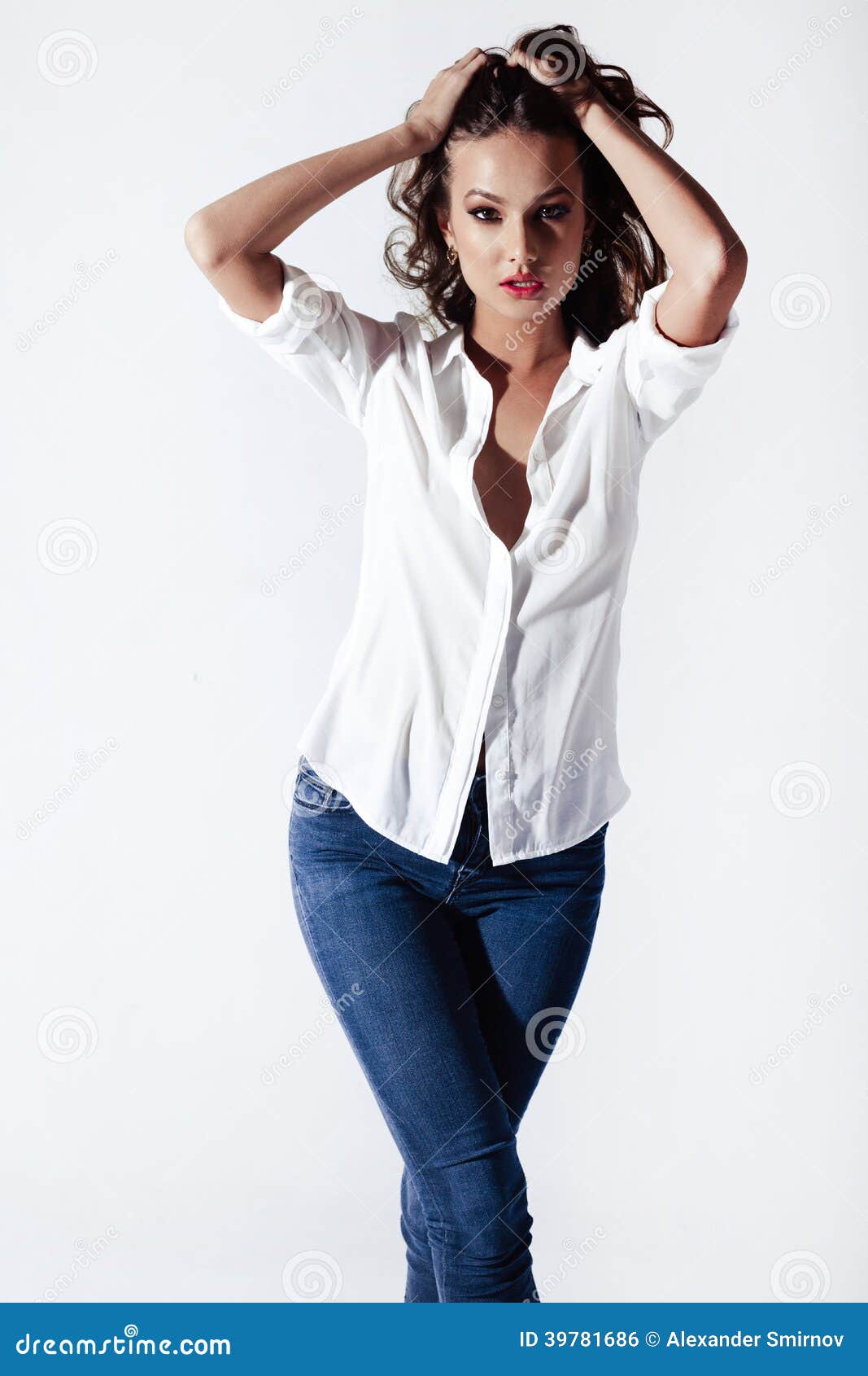 Fashion Model In A Blouse And Jeans Barefoot Stock Photo - Image of ...