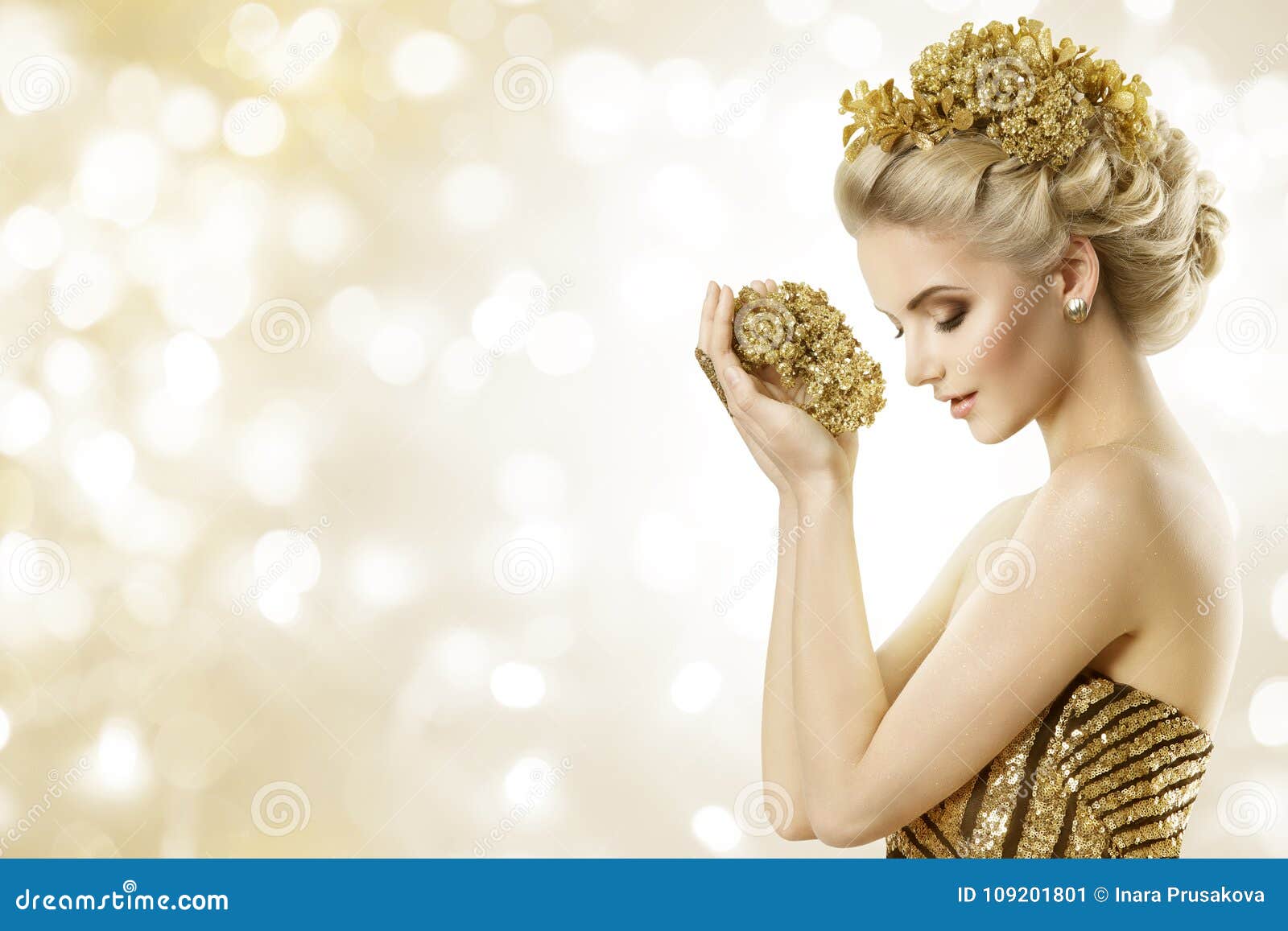 fashion model hold gold jewelry in hands, woman beauty hairstyle