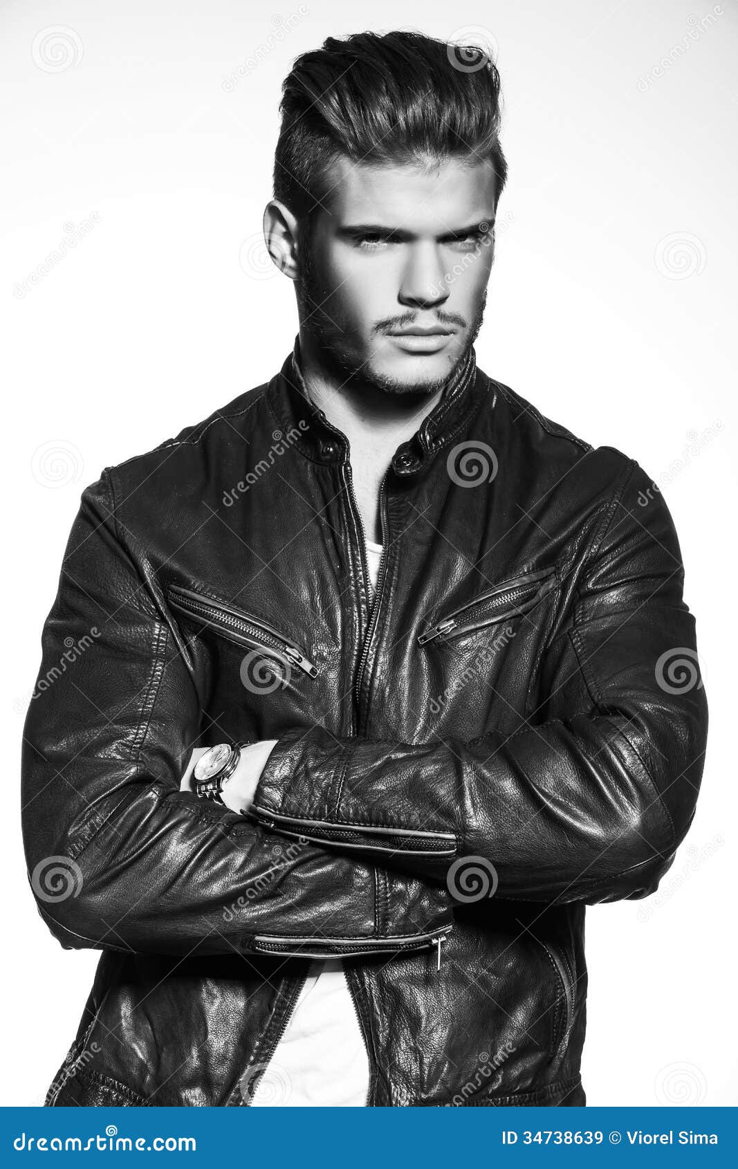 Fashion Model in Leather Jacket Standing with Hands Crossed Stock Image ...