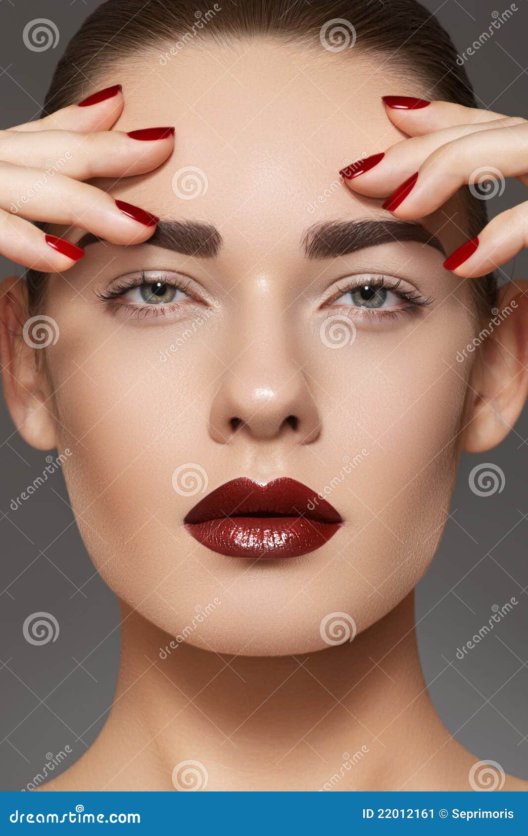 fashion model with lips make-up, manicure on nails