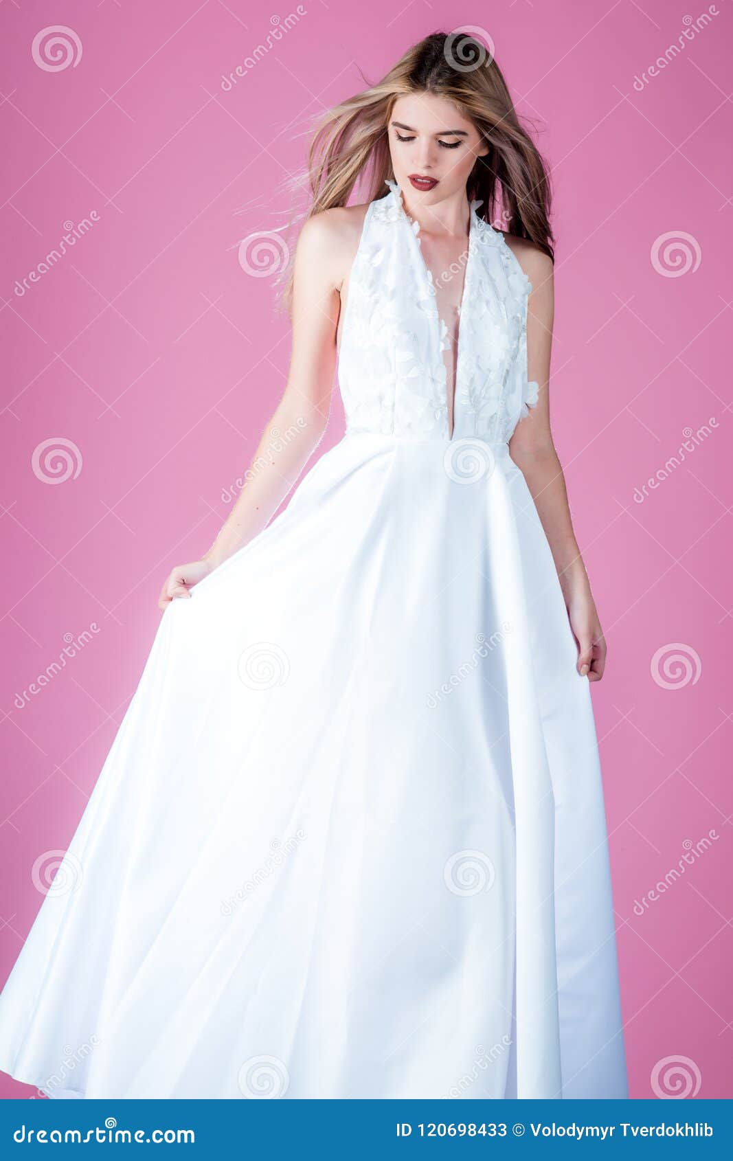 Wedding fashion and beauty salon. Sexy girls in white dress with