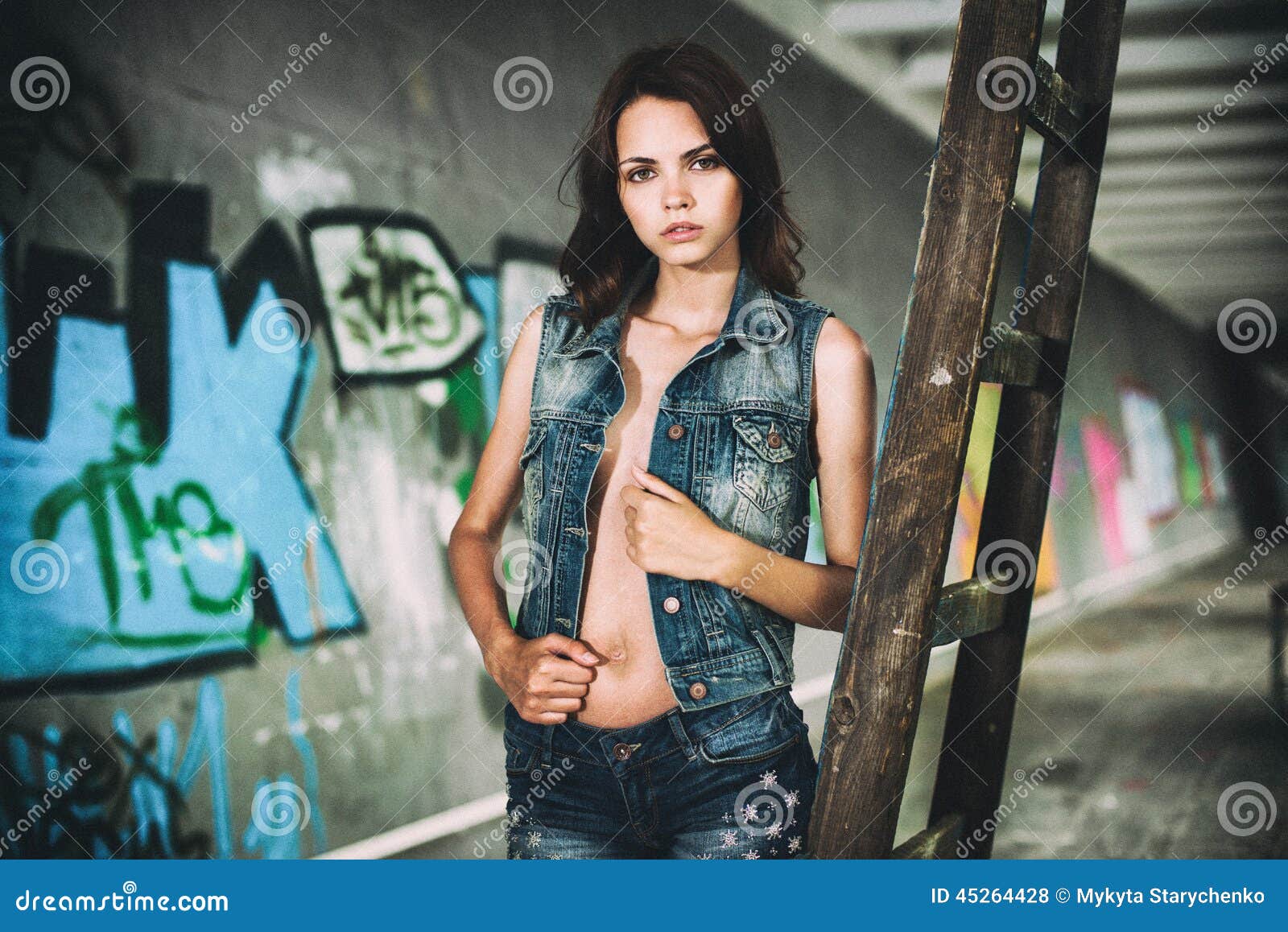 Fashion Model Woman Posing Near Graffiti Wall Stock Photo 