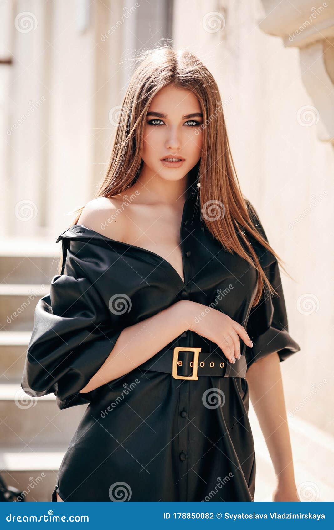 Beautiful Woman with Dark Hair in Elegant Clothes Posing in the Street  Stock Photo - Image of girl, brunette: 178850082