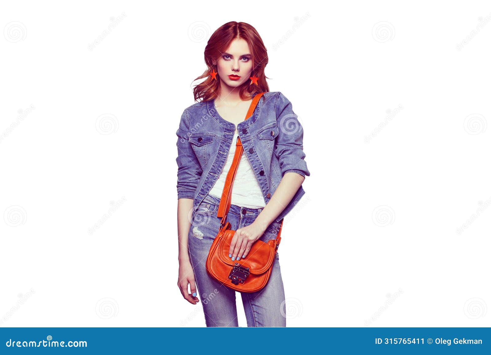 fashion portrait of beautiful young woman with handbag