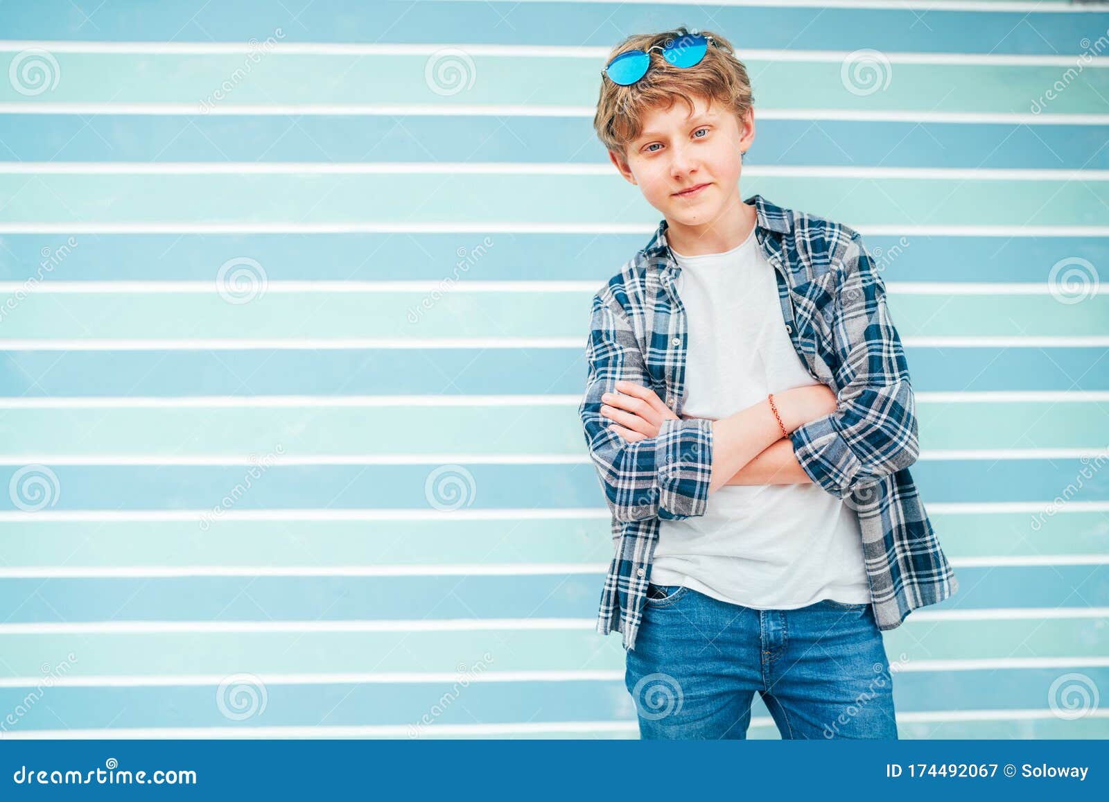 Fashion Portrait of Caucasian Blue-eyed Blonde Hair 12 Year Old Teenager  Boy Dressed T-shirt and Checkered Shirt with Sunglasses Stock Image - Image  of blueeyed, model: 174492067